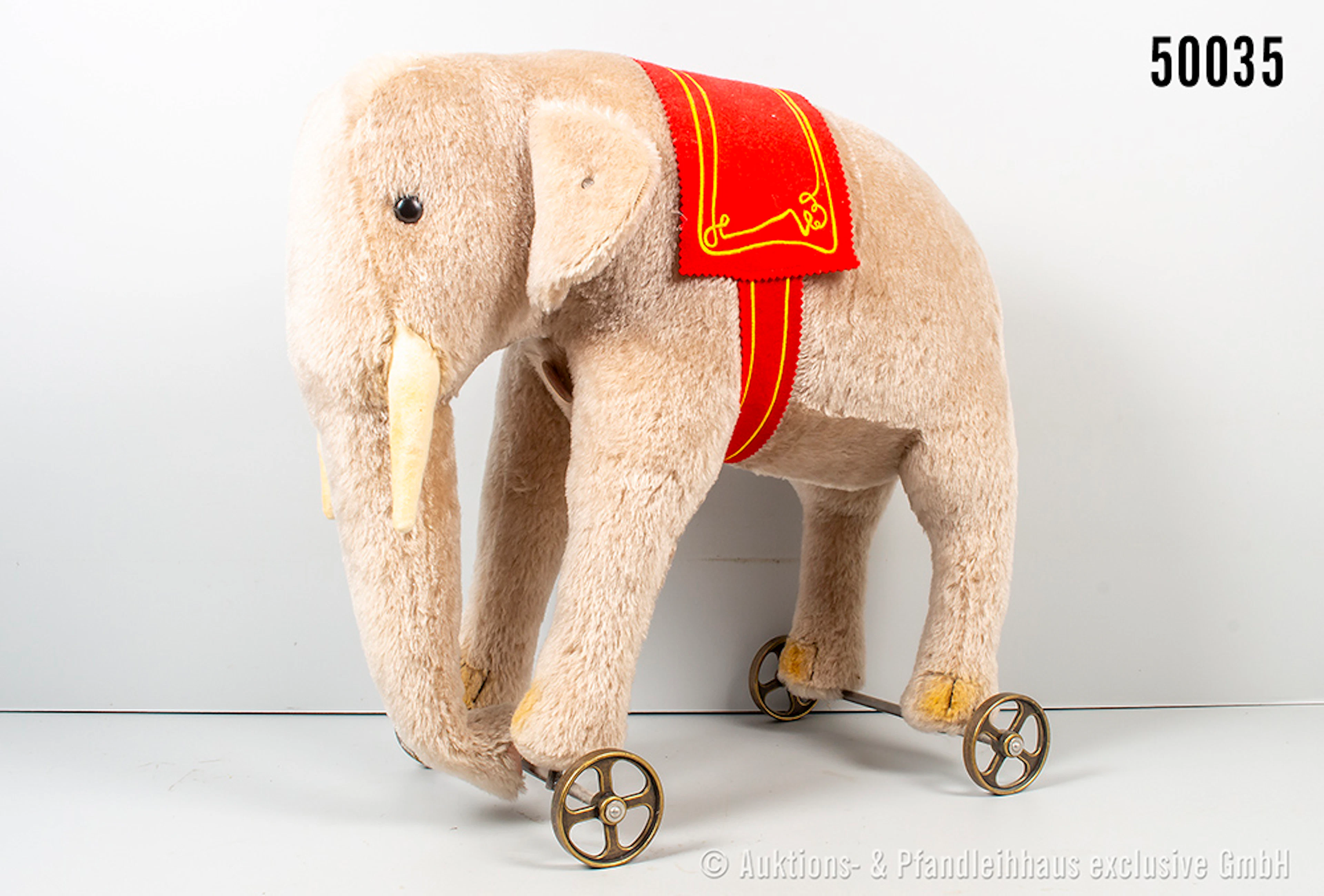 Steiff Replika Elefant auf Rädern, Mohair/ Metall, Knopf und Schild