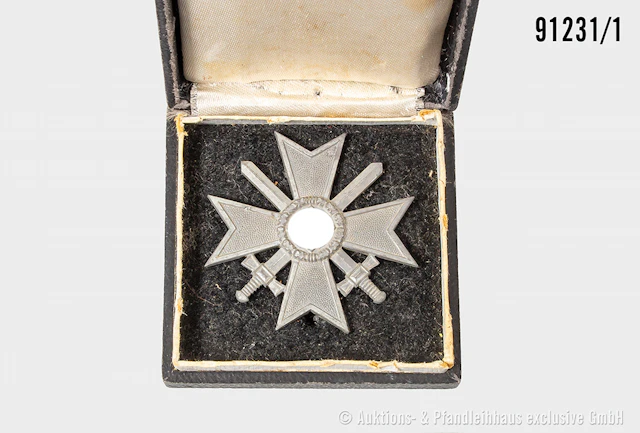 KVK 1. Klasse mit Schwertern, Zinkausf., im beschädigtem Etui, gemischter