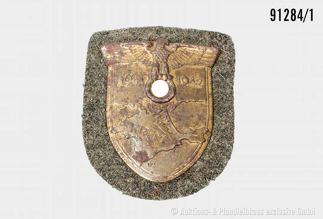 Krimschild, Eisenausf., komplett mit Gegenplatte, 4 Splinten, Heeresstoff