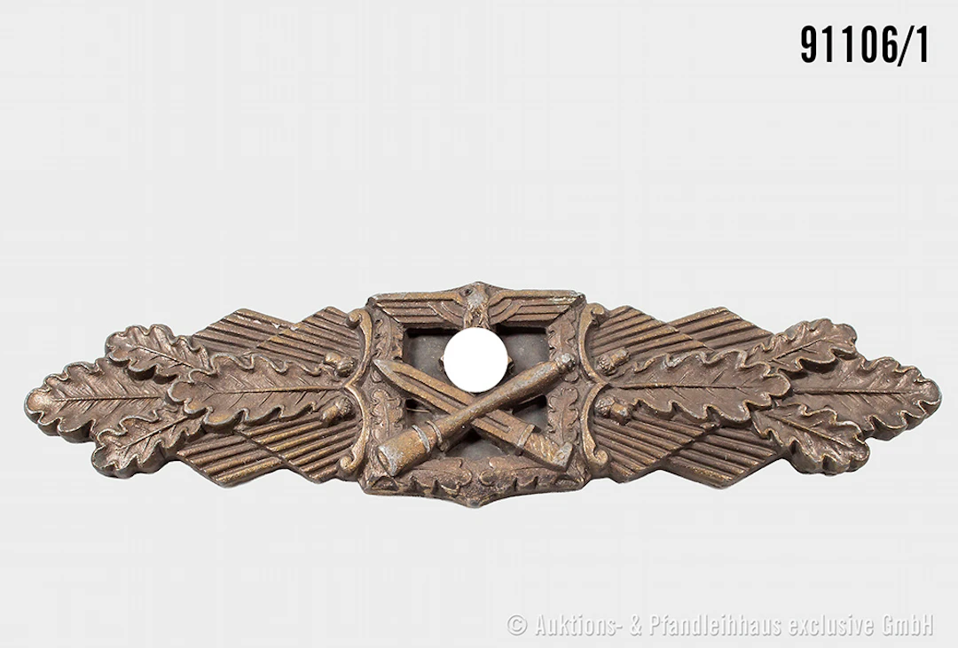 Nahkampfspange in Bronze, Zinkausführung, Herstelle "Juncker", dazugehöiges