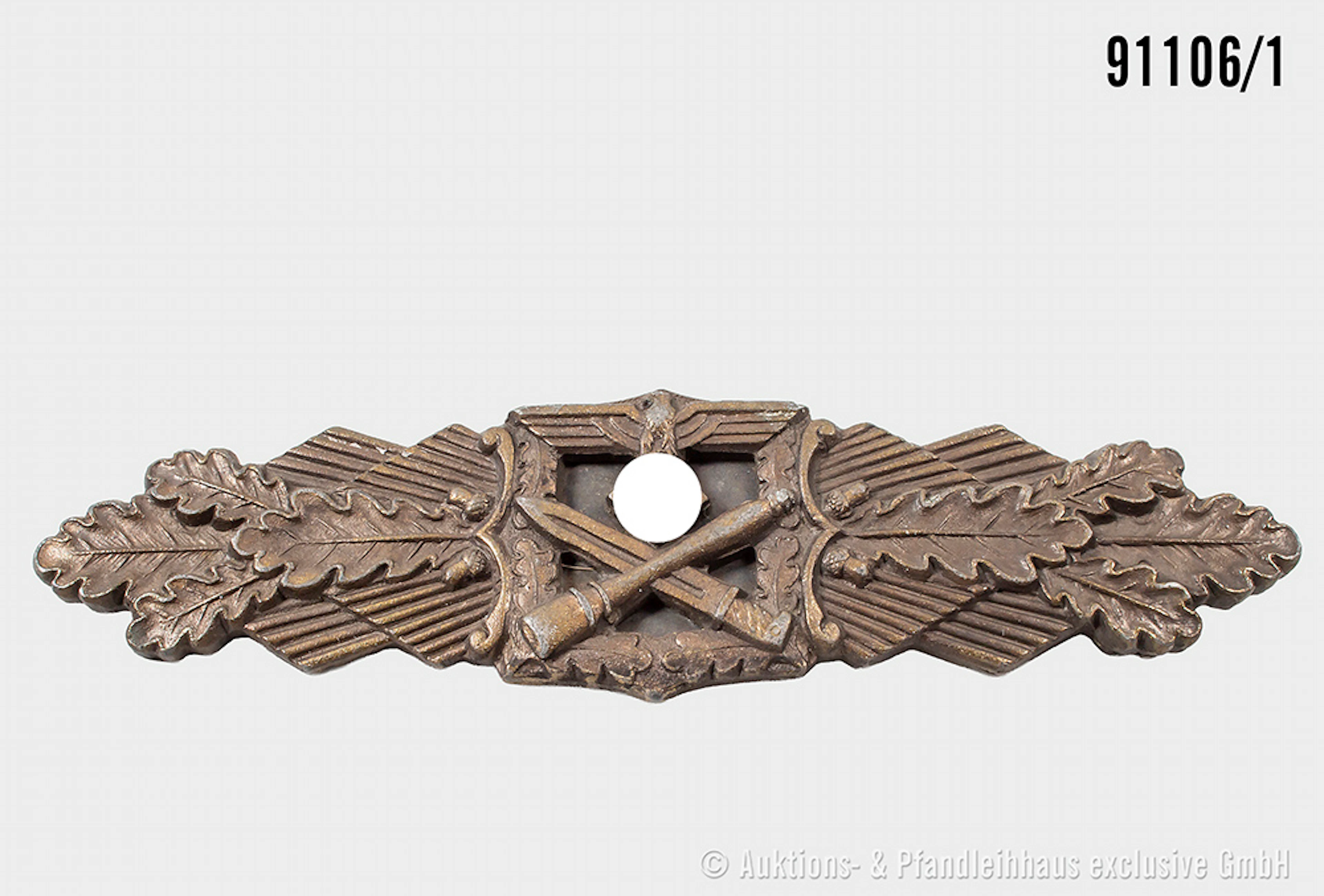 Nahkampfspange in Bronze, Zinkausführung, Herstelle "Juncker", dazugehöiges