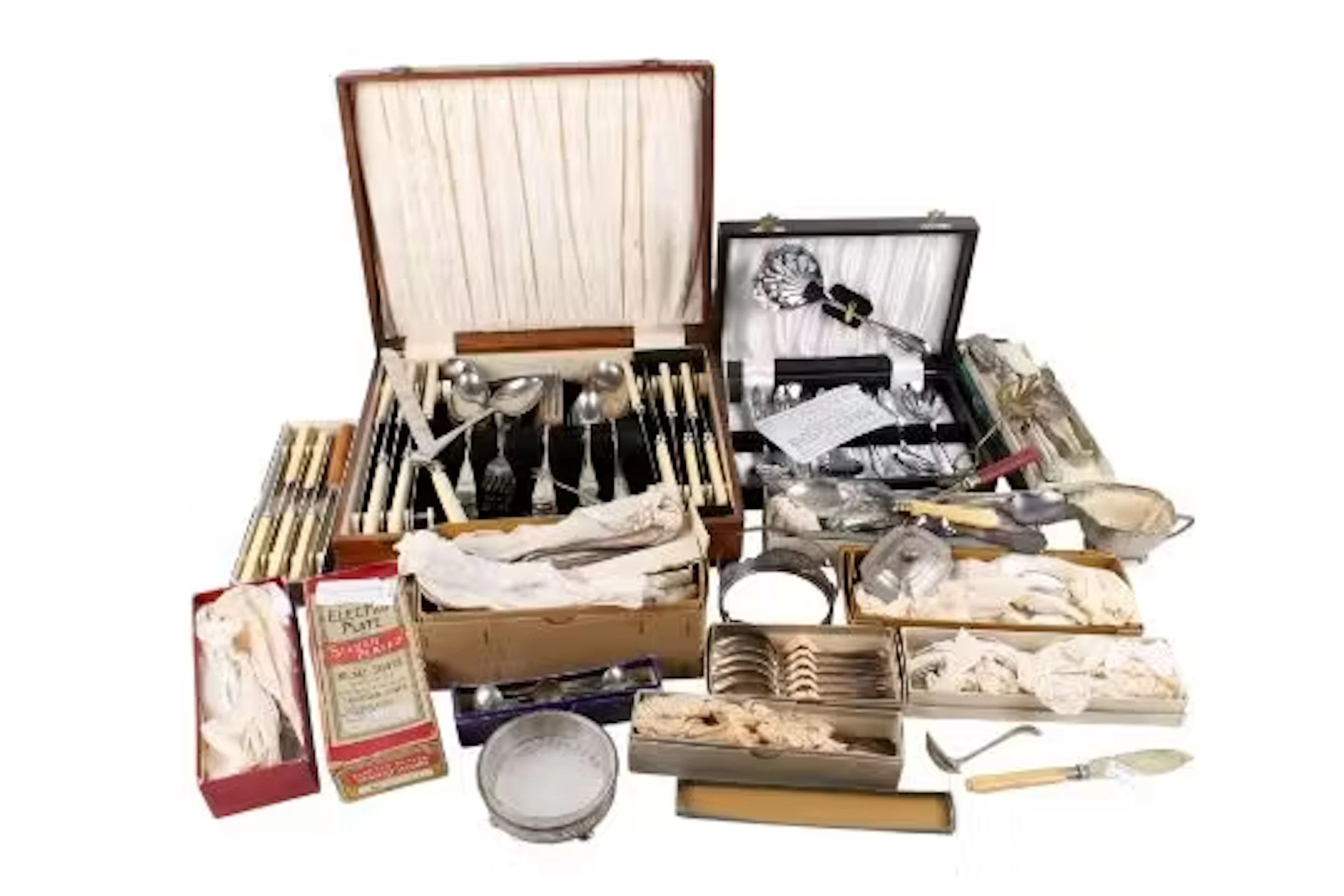 A collection of assorted vintage silver plated cutlery.