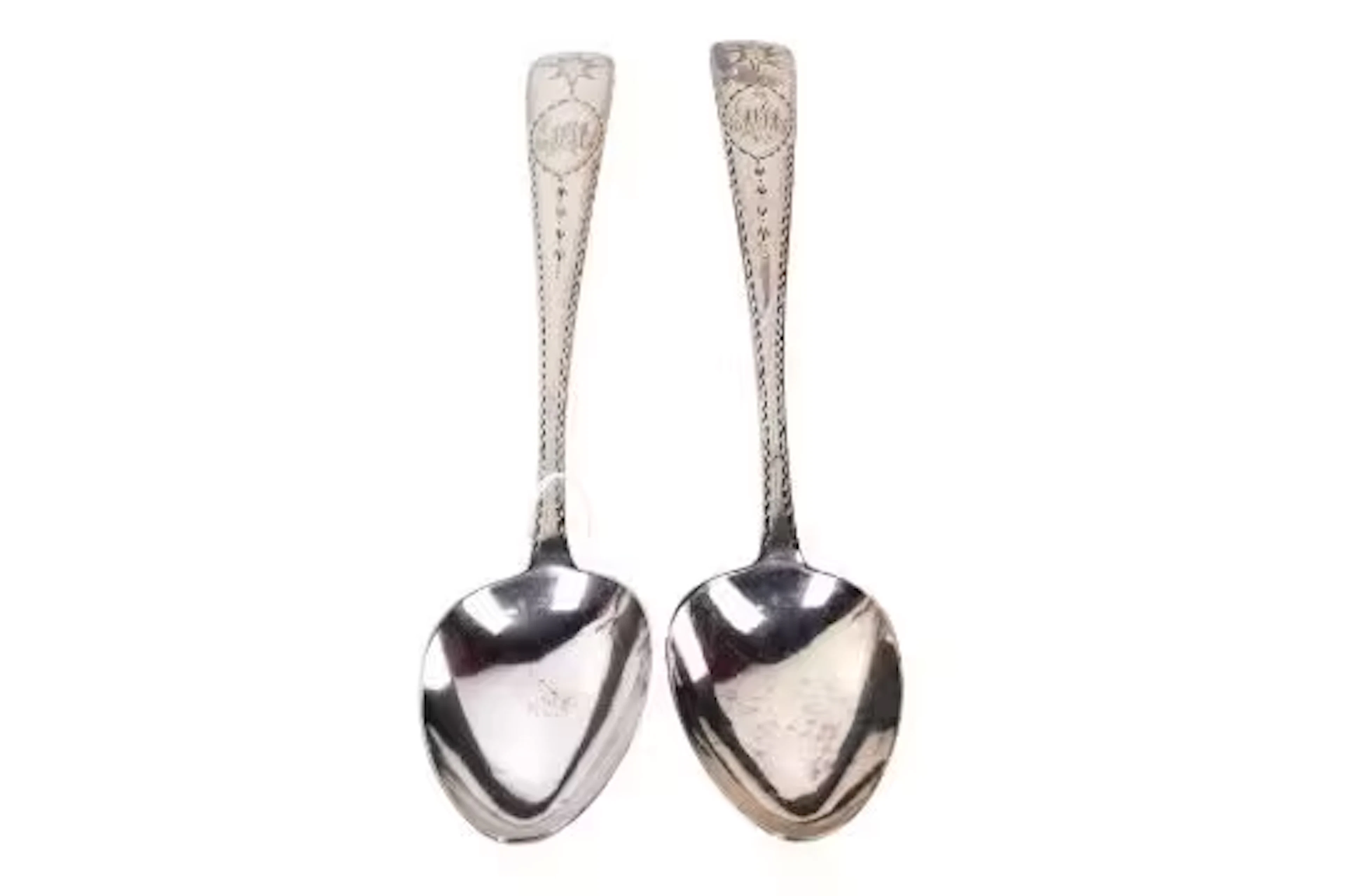 A pair of George III Irish silver serving spoons.