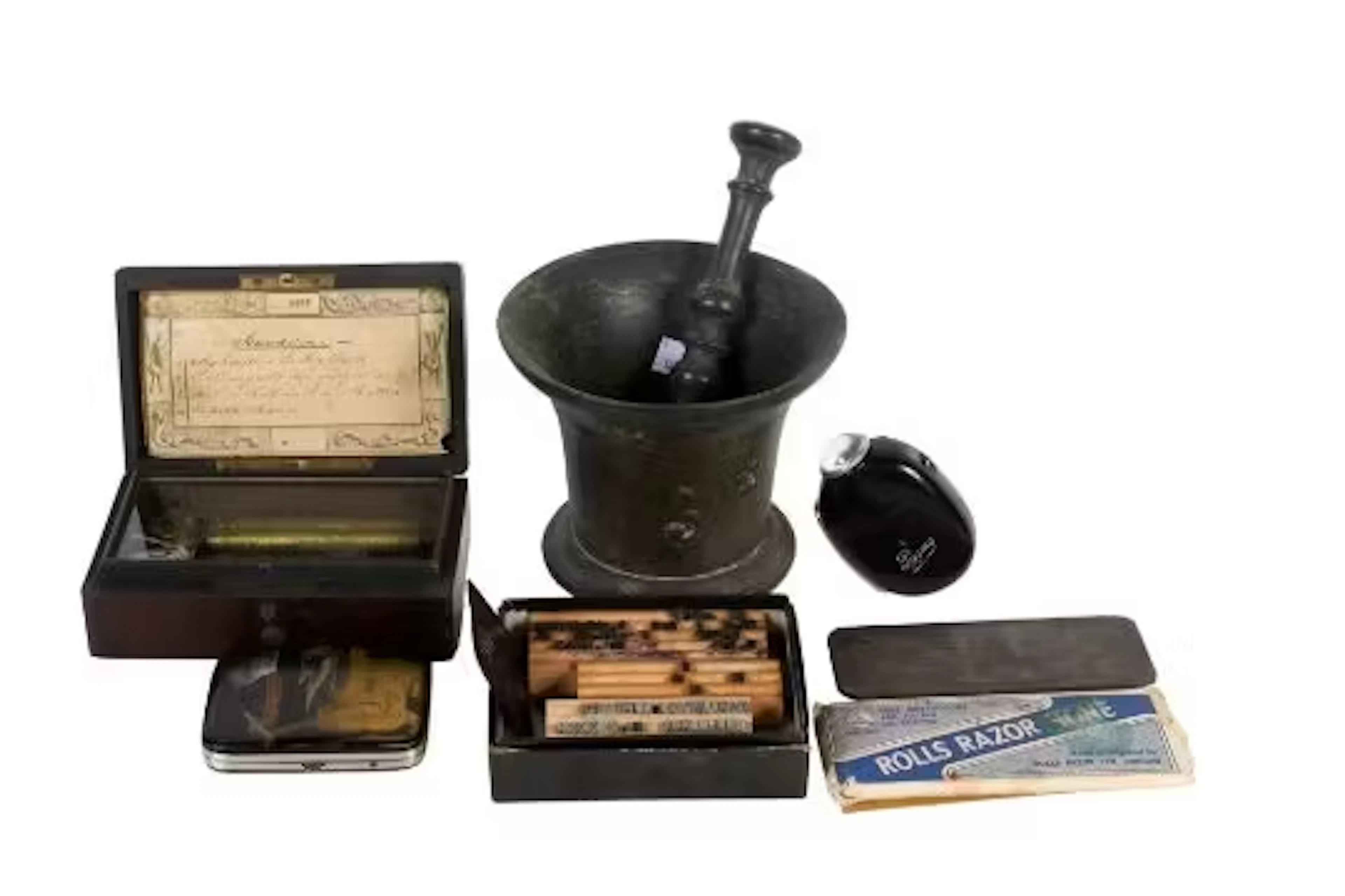 A group of assorted vintage collectables.