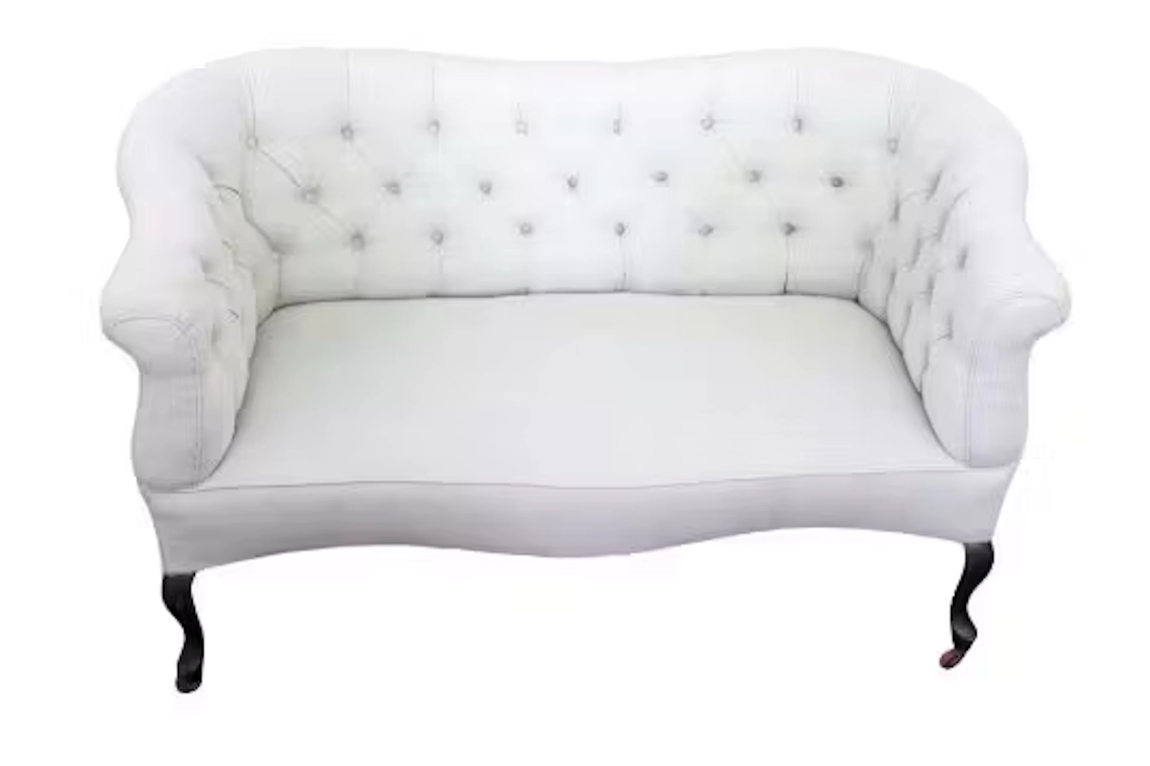 A vintage button back sofa, in the Victorian style, upholstered in