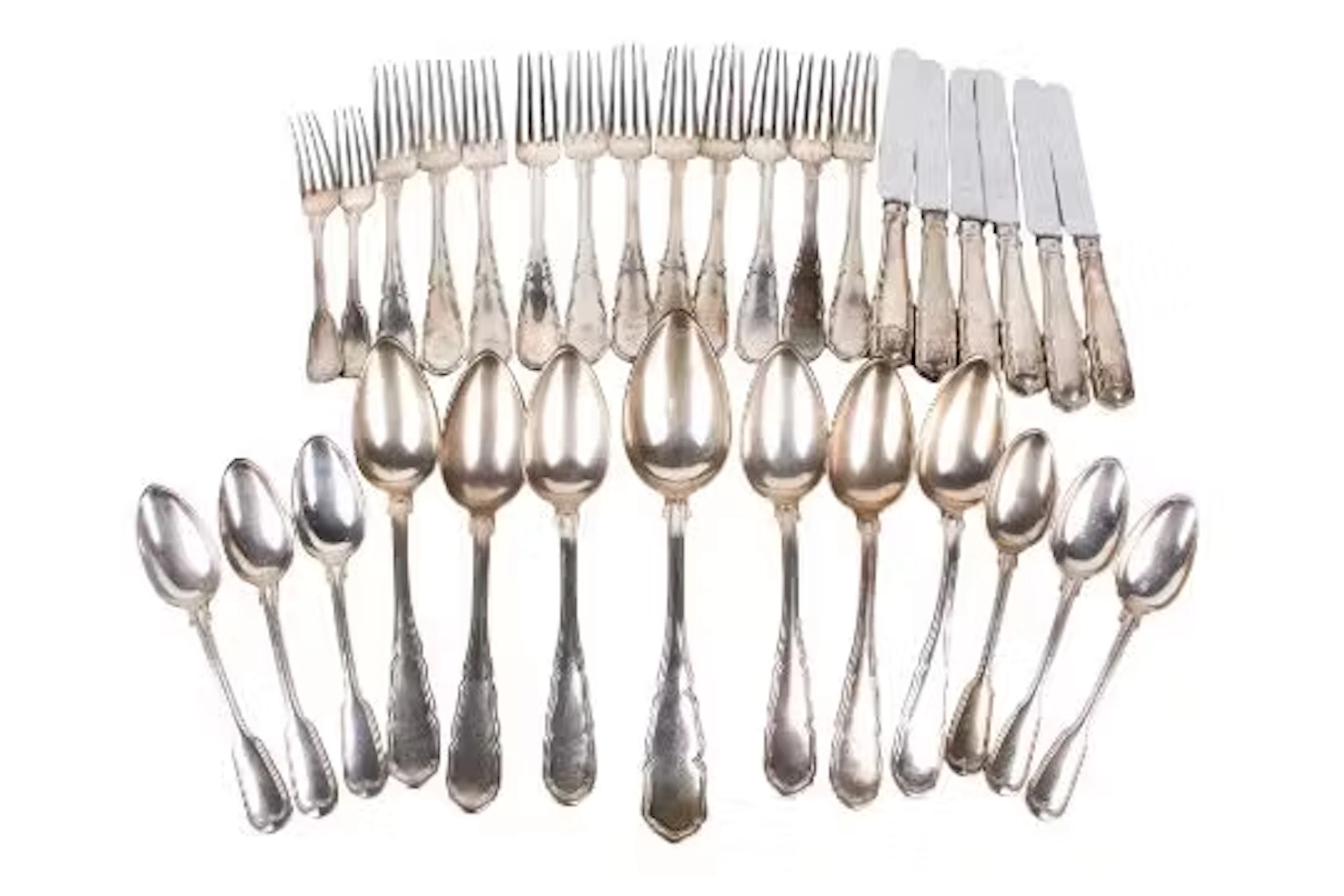 Two groups of matched Austrian silver cutlery, some with a raised crest.