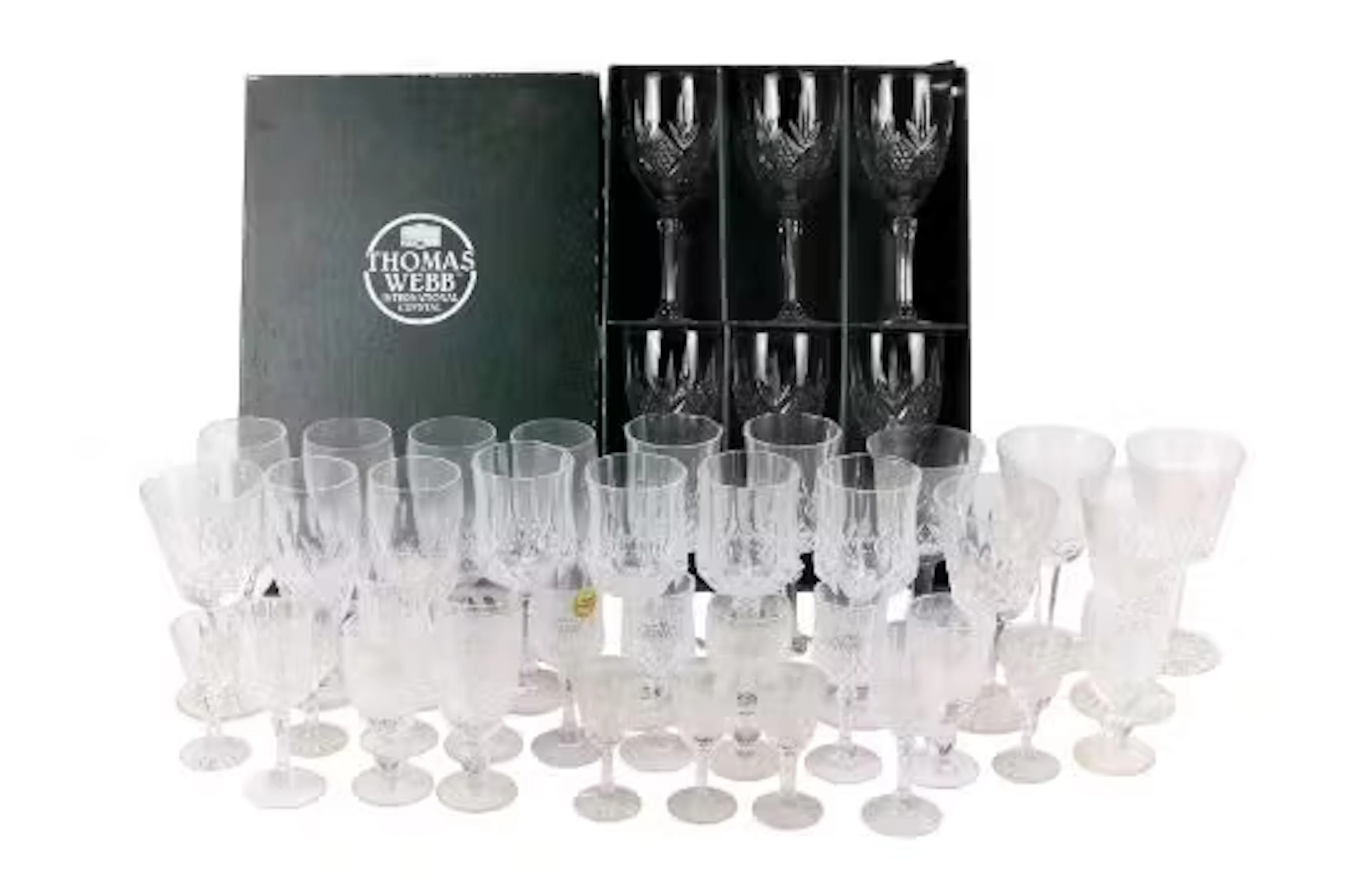 A collection of assorted drinking glasses. Including French crystal