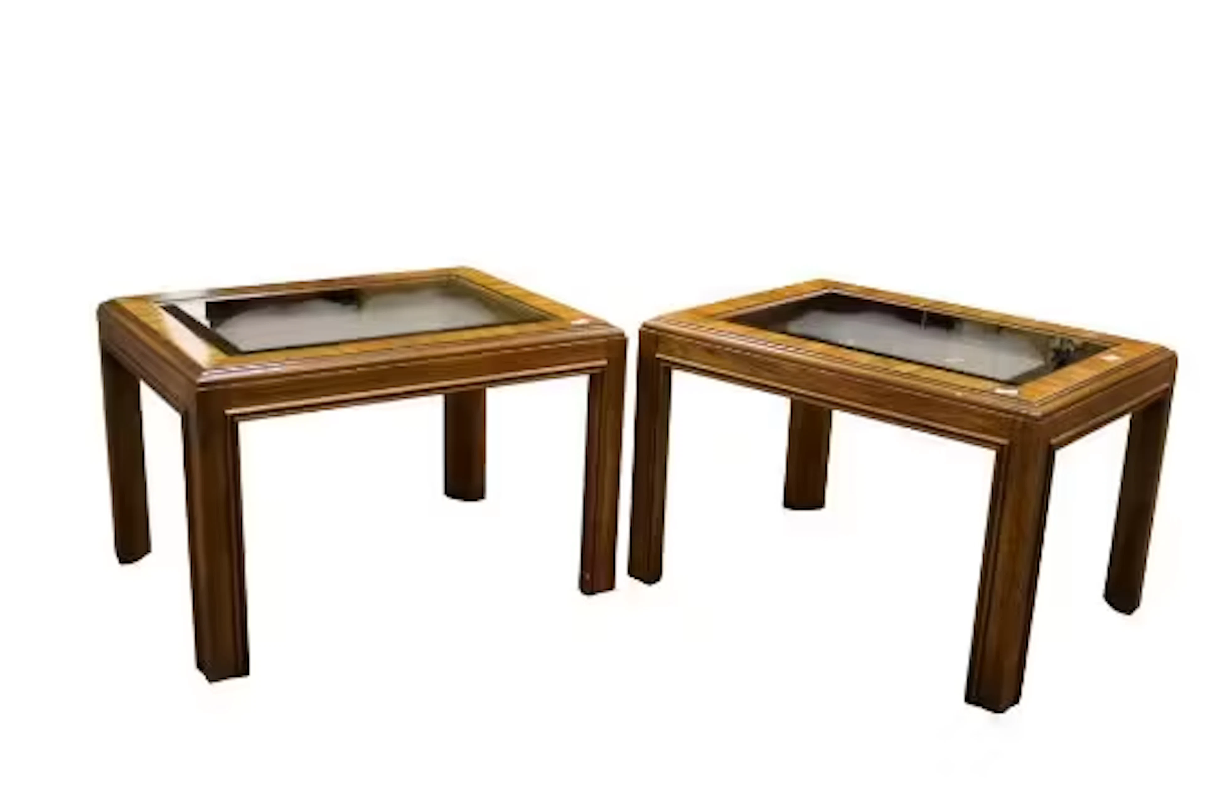 A pair of contemporary wooden glass top coffee tables.