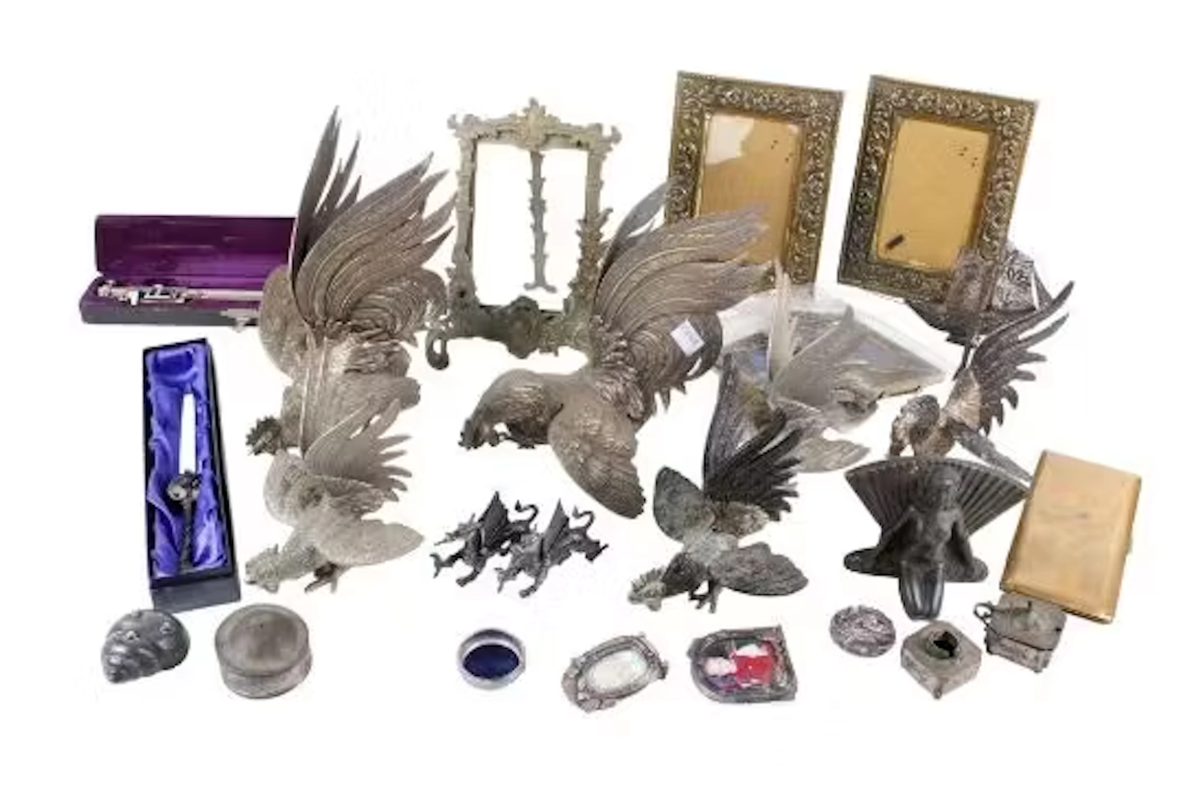 An assortment of silver plate and metalware.