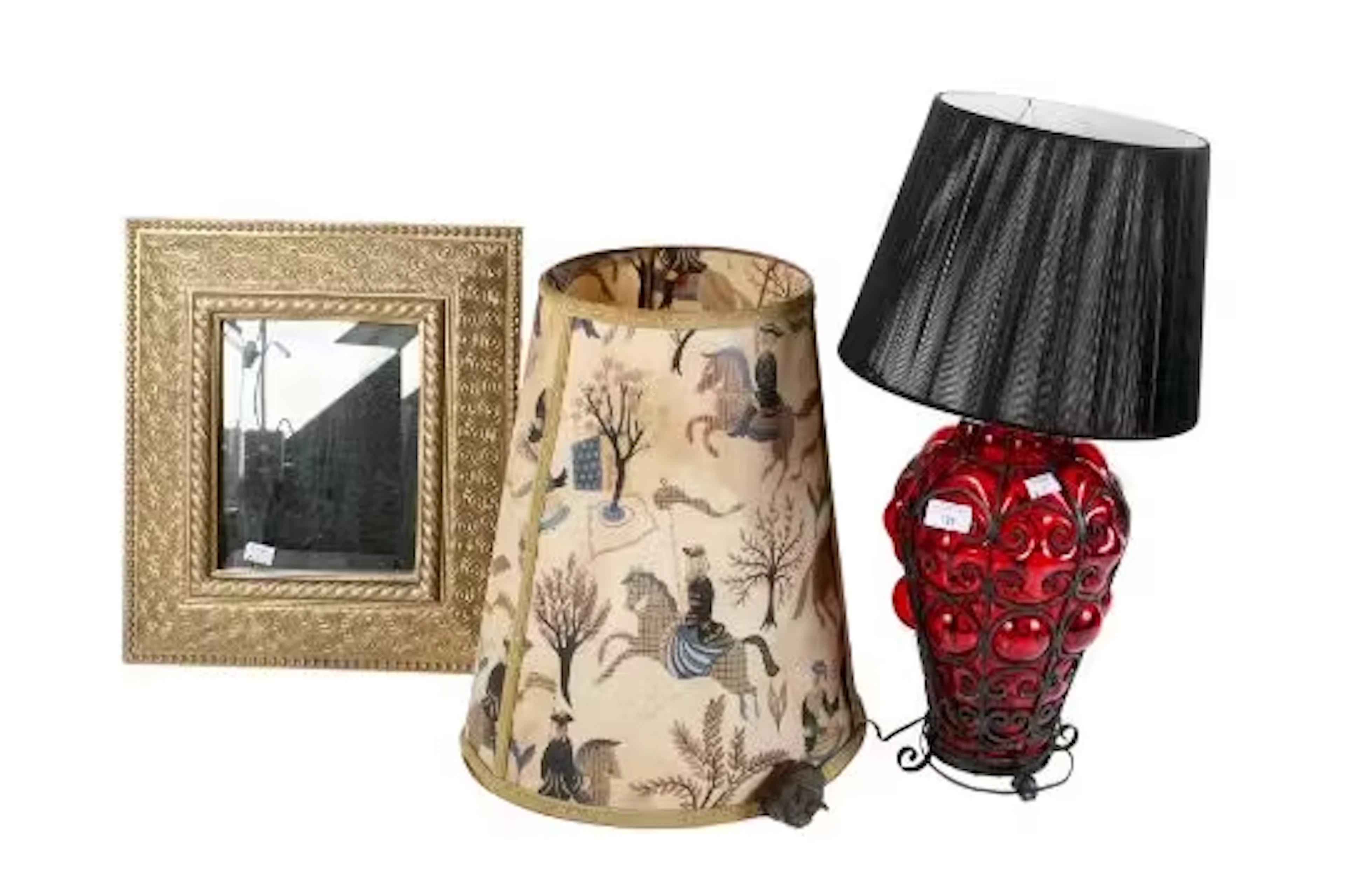 A Venetian Murano style red glass table lamp, wall mirror and a shade.