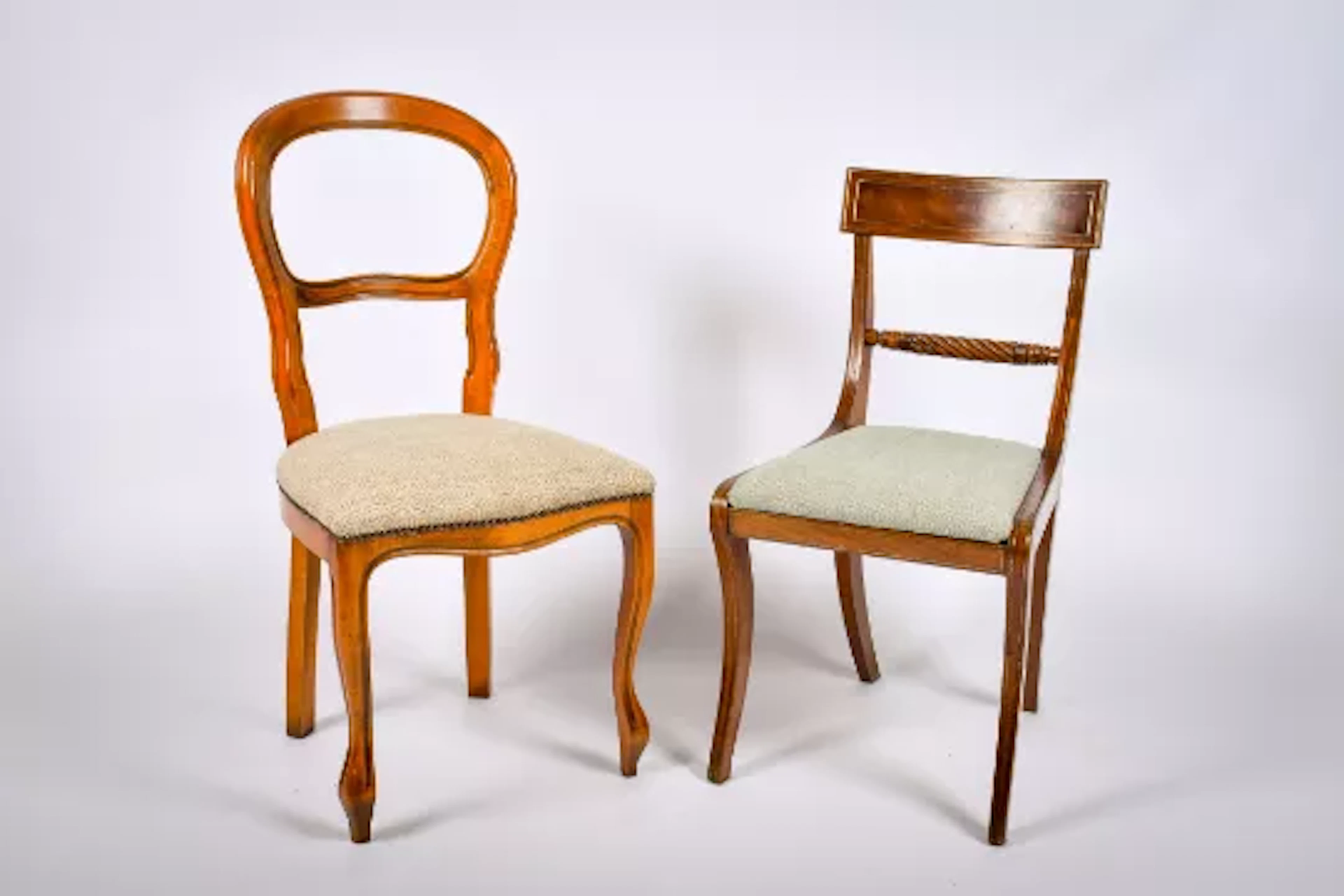 Two assorted dining chairs.
