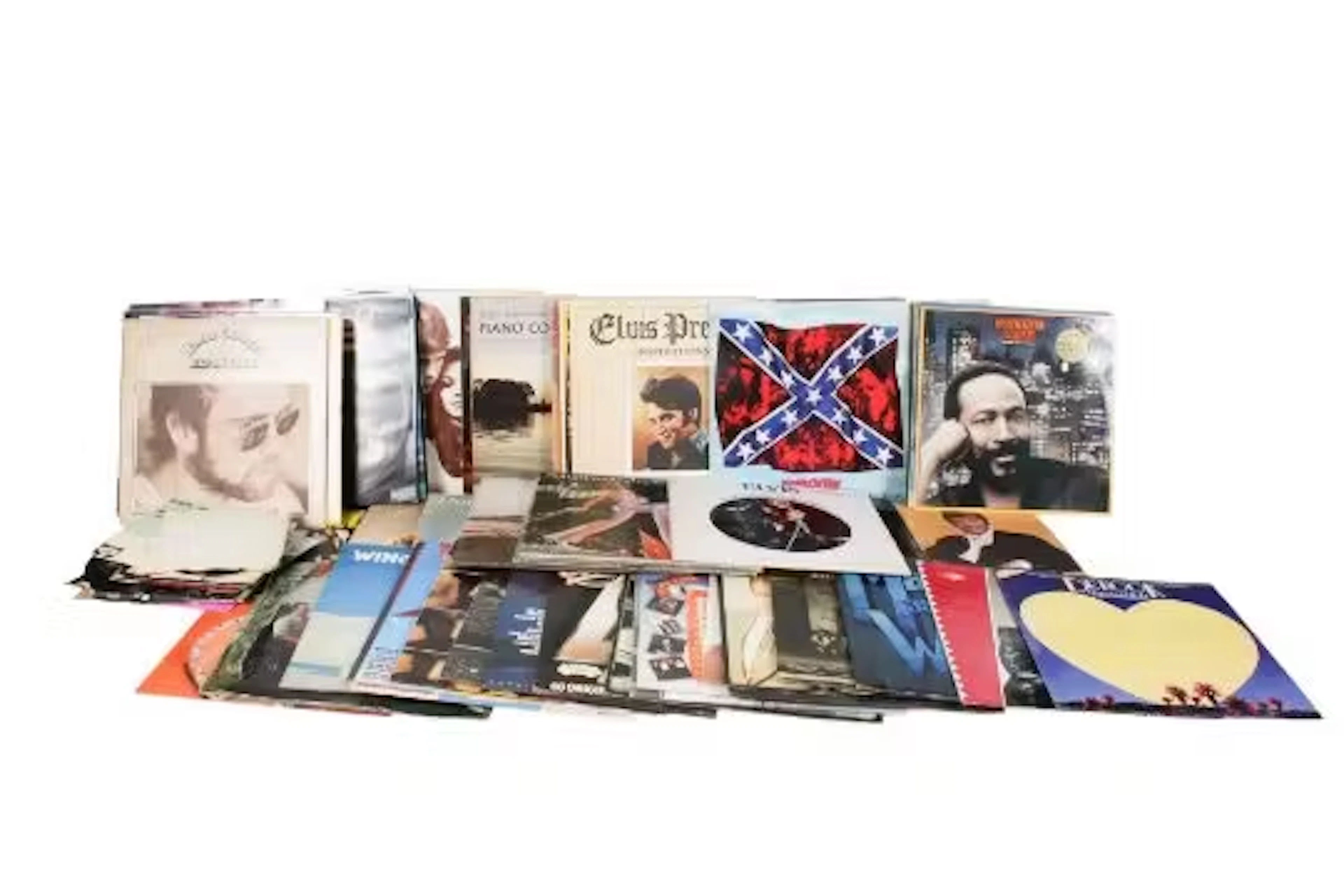 A collection of vintage vinyl and LP records.