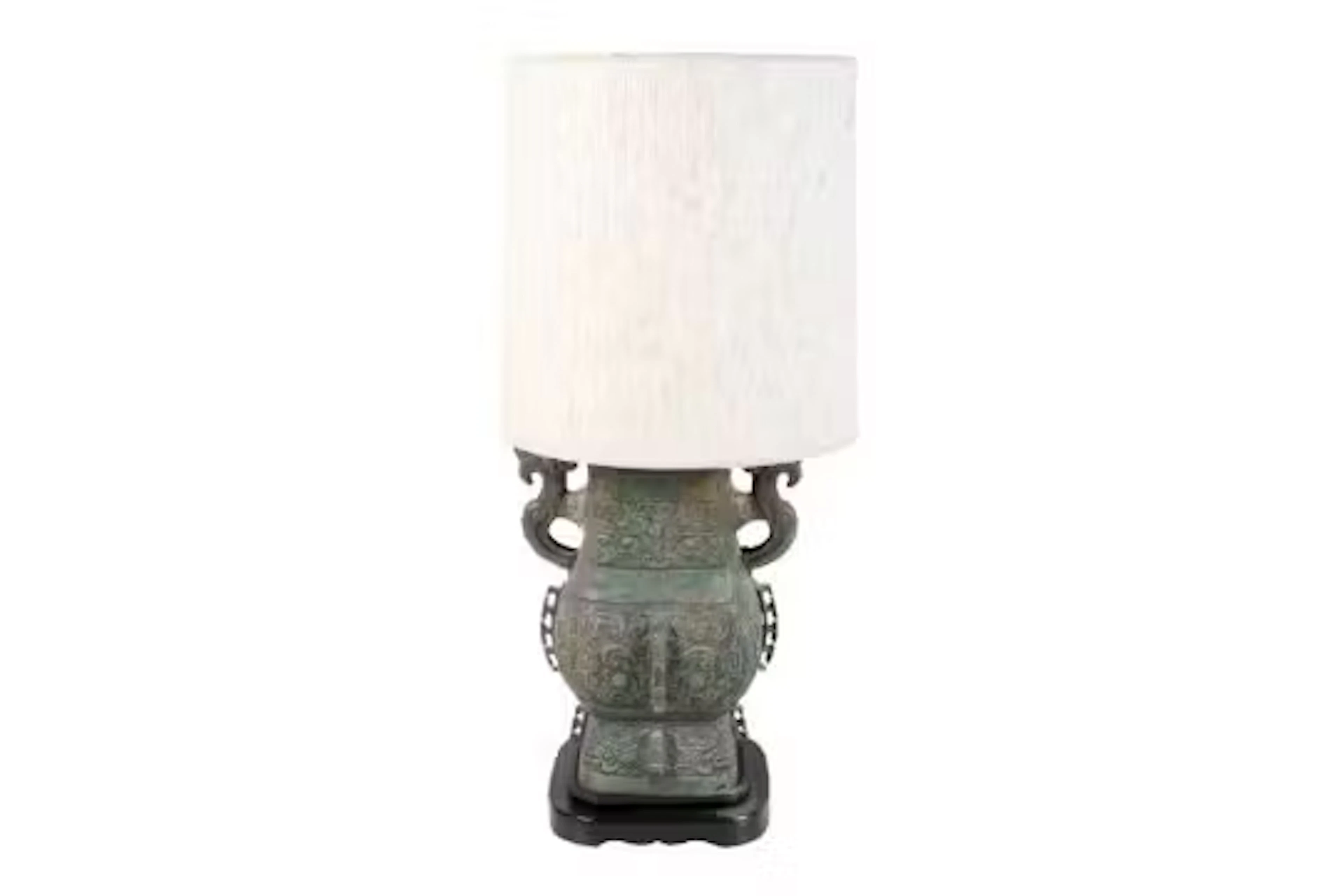 A contemporary Chinese style metal lamp.