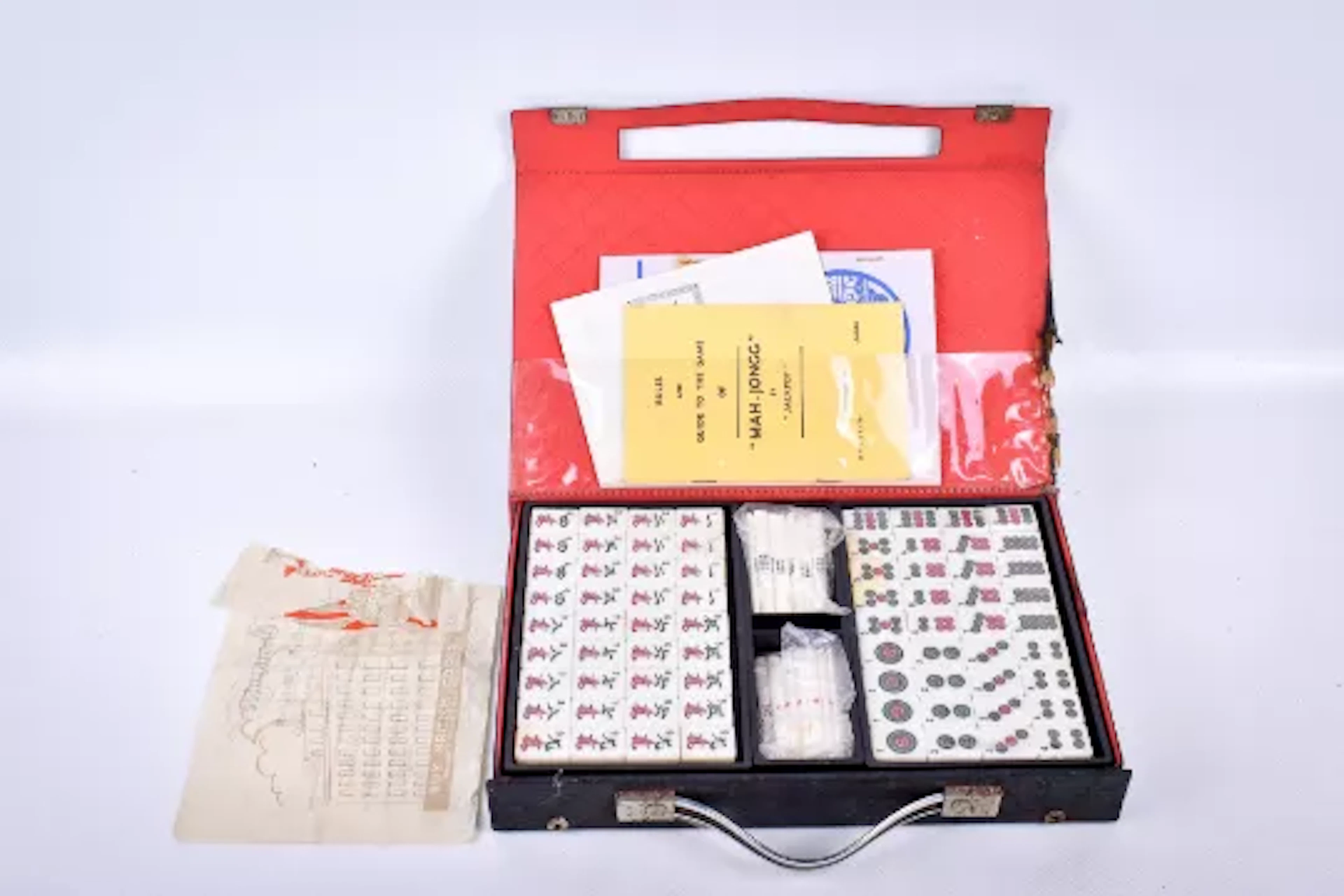 A set of the Chinese 'game of the four winds', Mah-jong, cased.