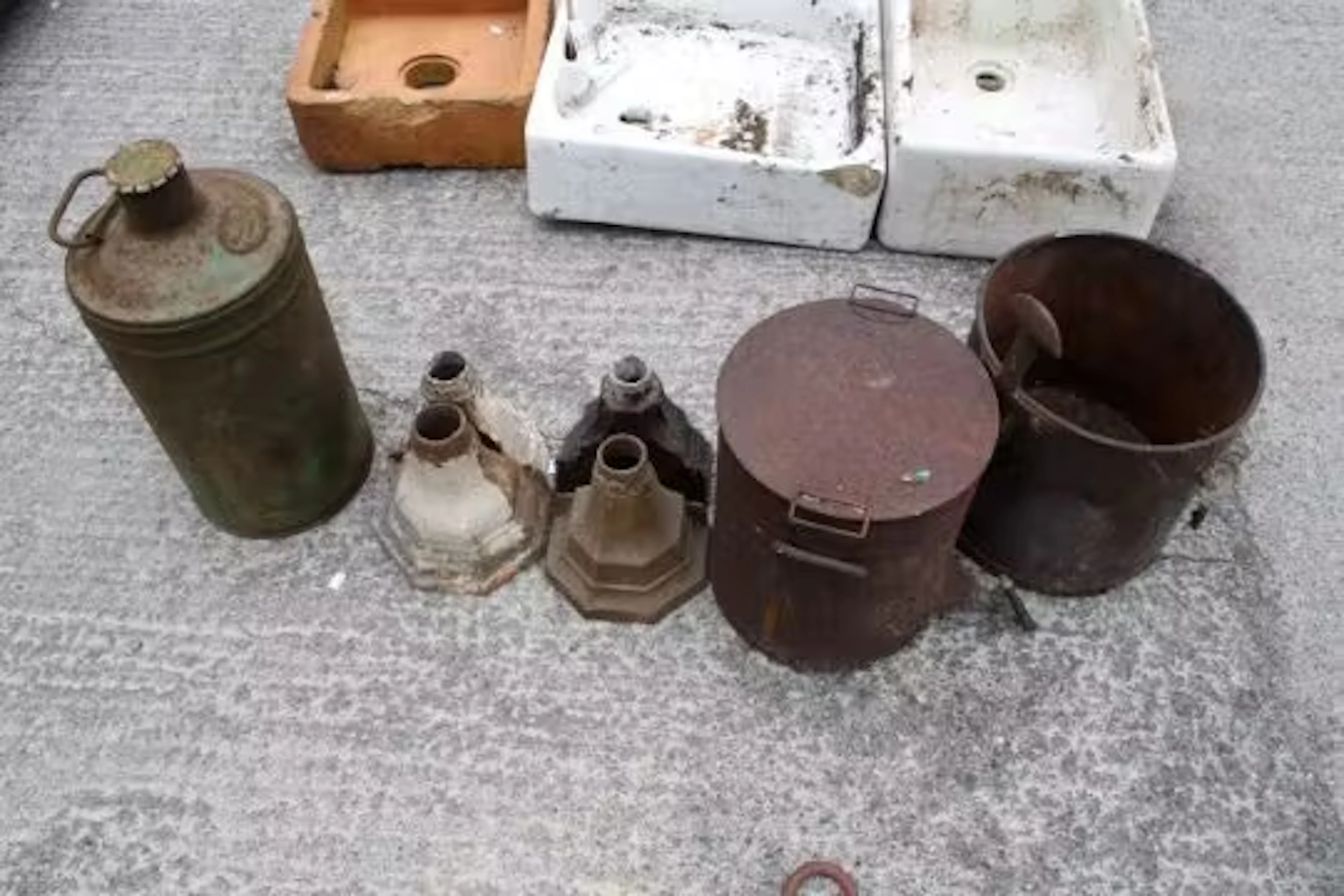 An assortment of vintage and antique metalware.