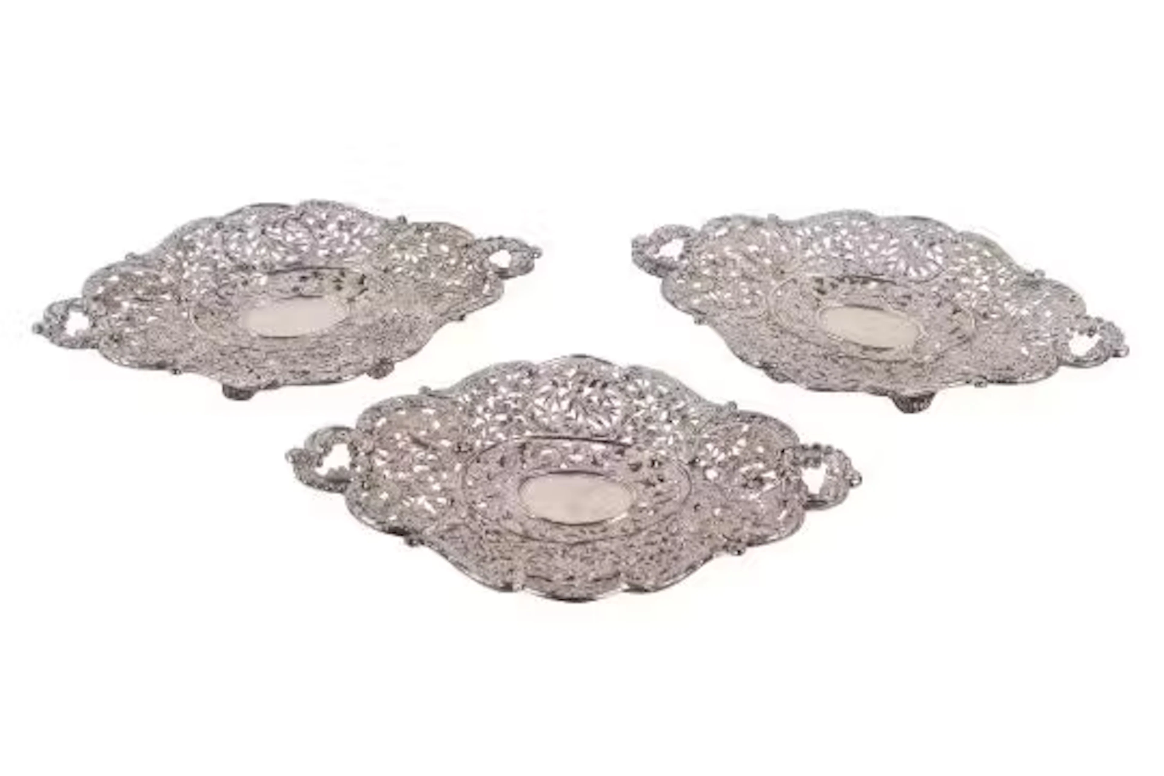 Three Chinese silver dishes by Wang Hing & Company.