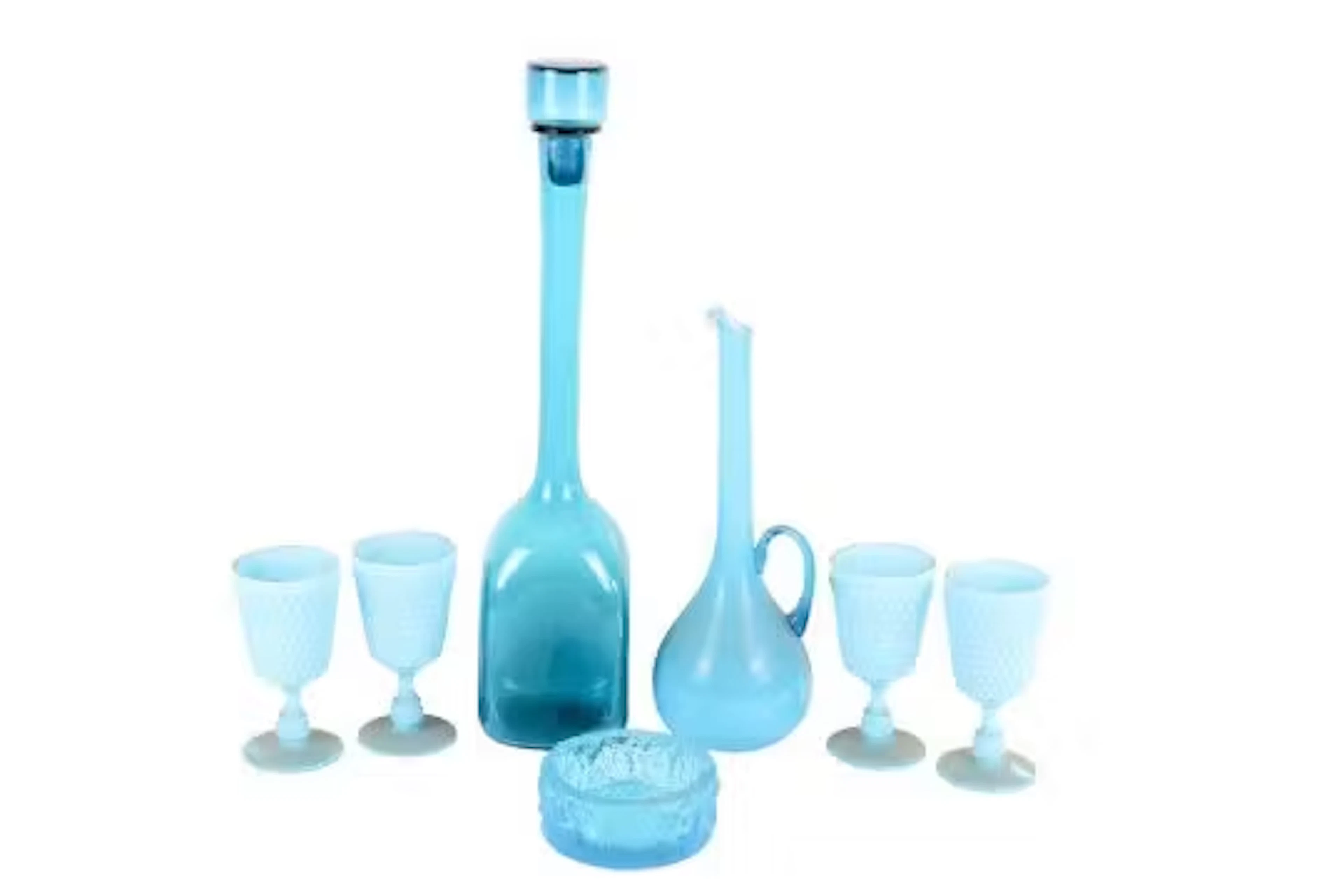 A collection of mid-century blue glassware.