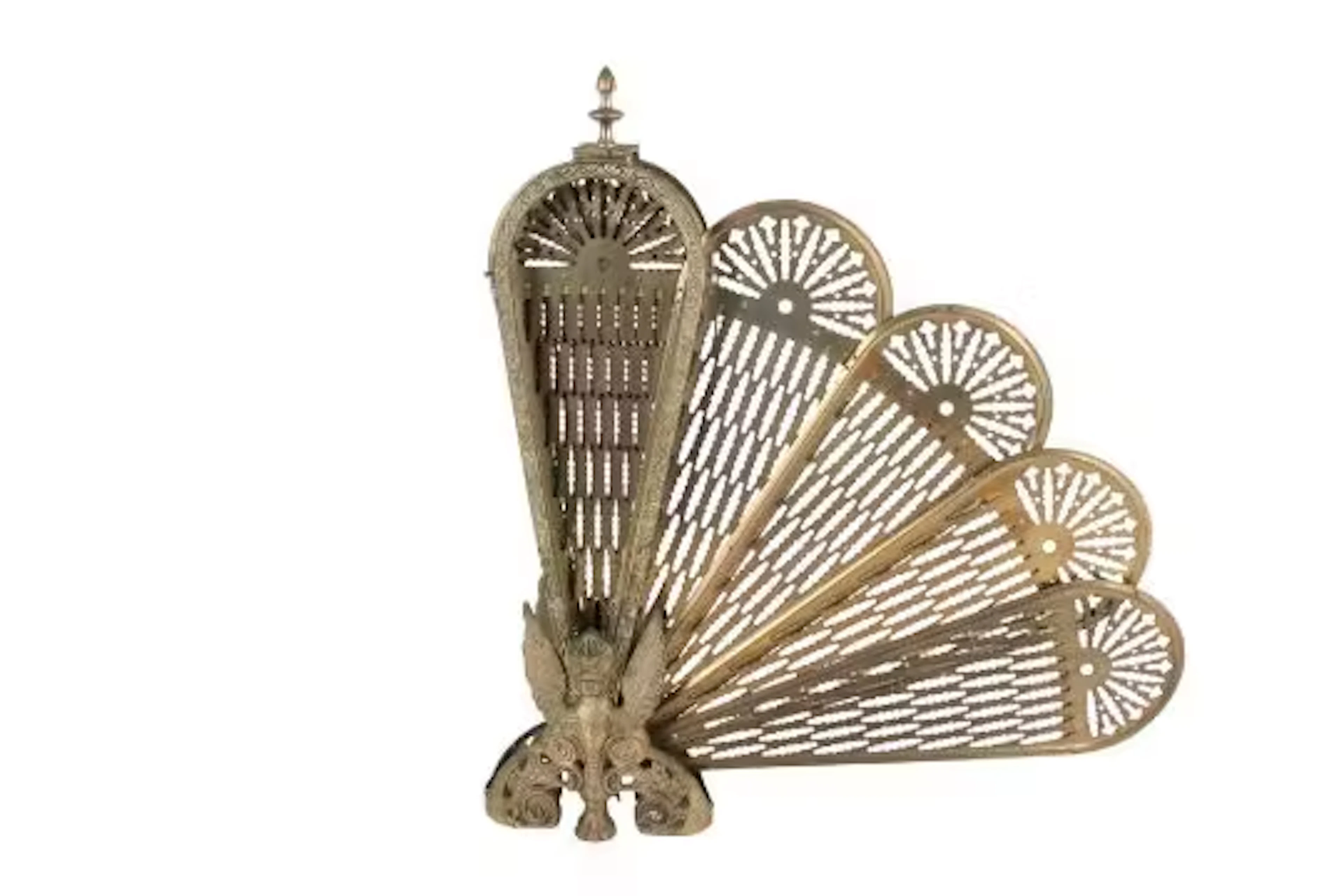 A vintage brass folding firescreen.