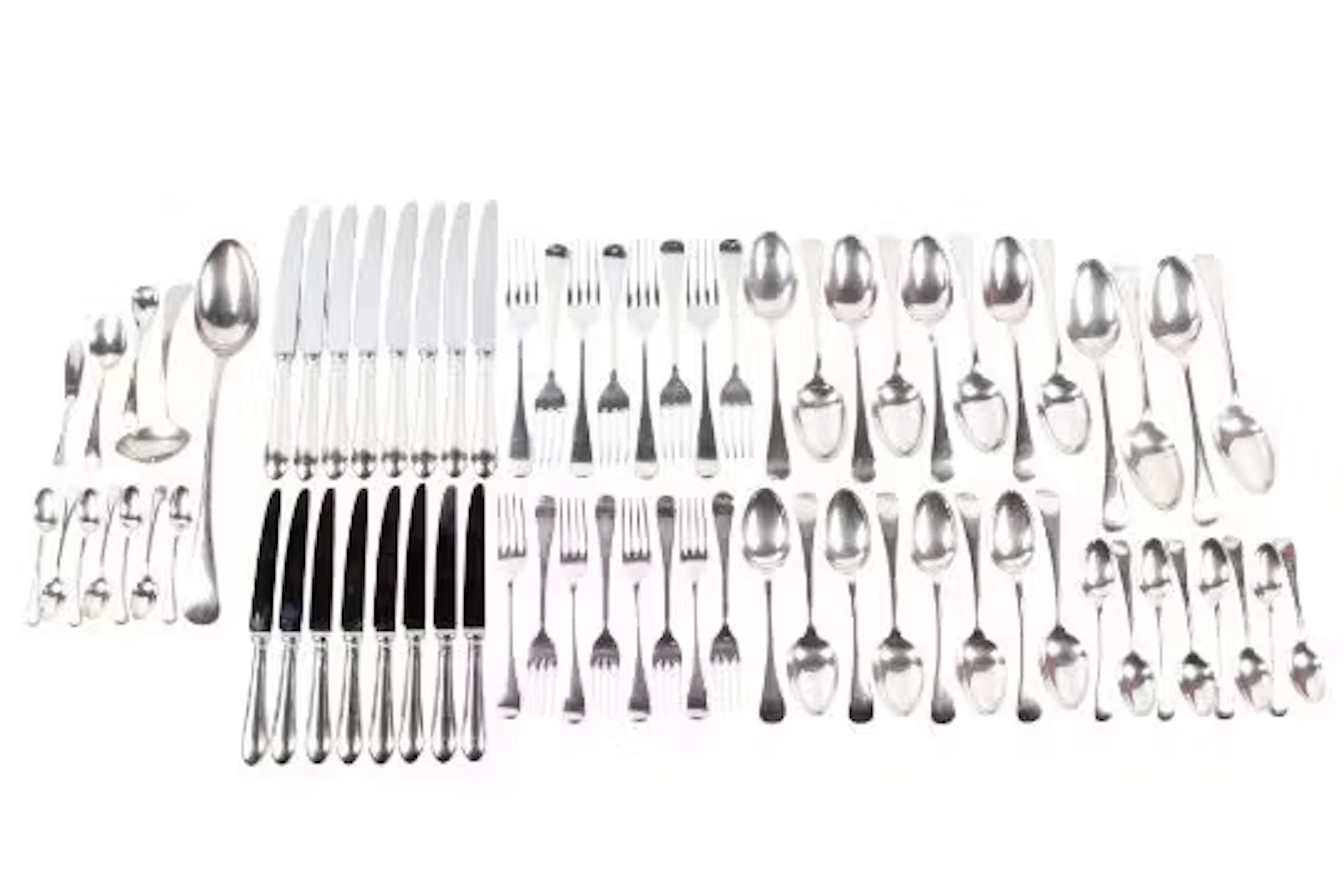An extensive late 19th/20th century matched silver cutlery set.