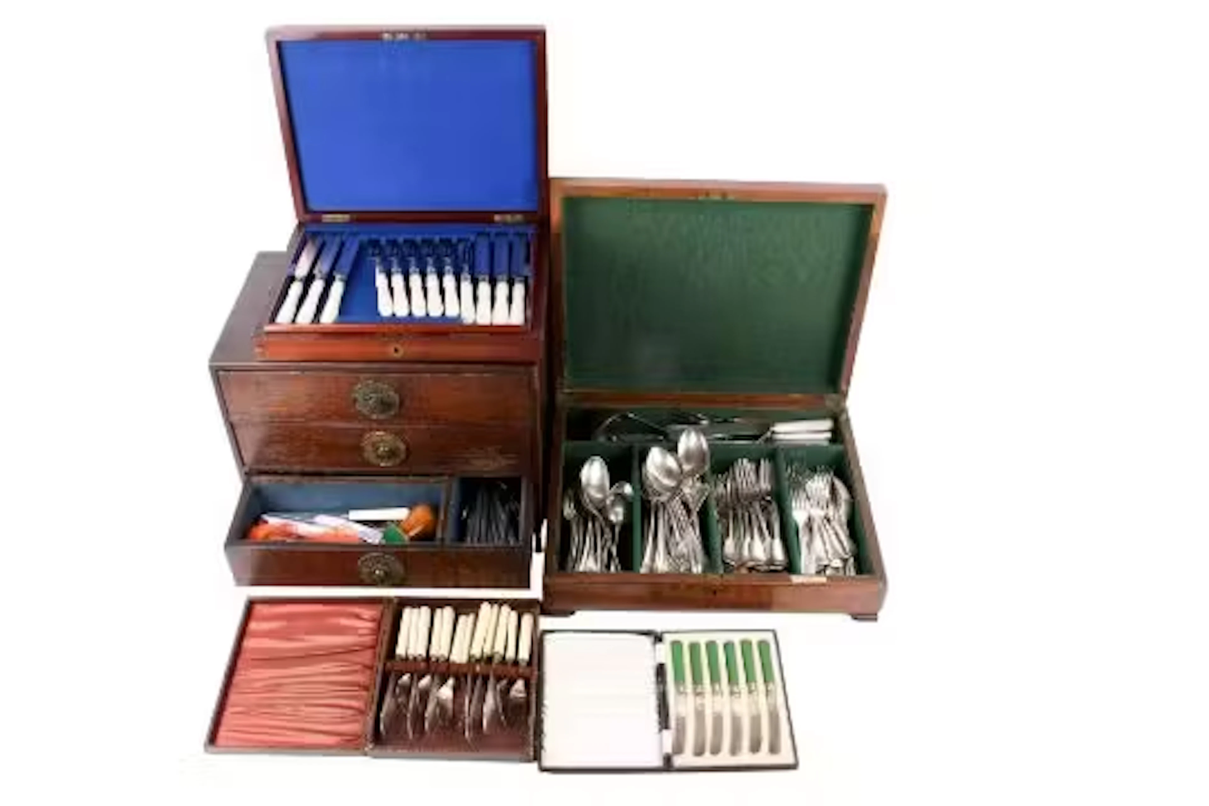 A collection of assorted silver plated cutlery sets.
