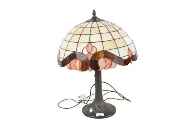 A modern 'Tiffany' style table lamp with leaded glass shade.