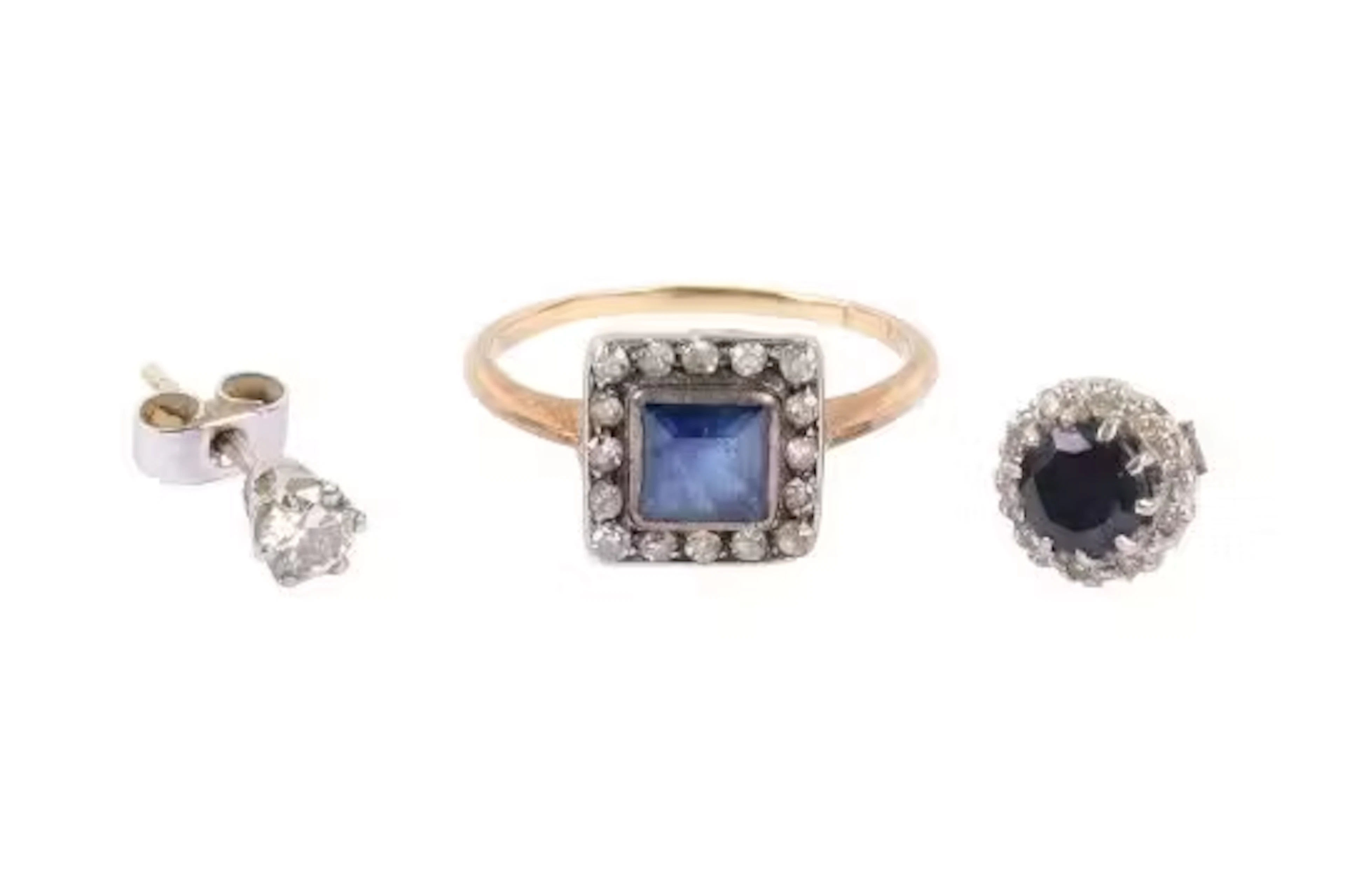 An 18ct gold dress ring and two earrings.