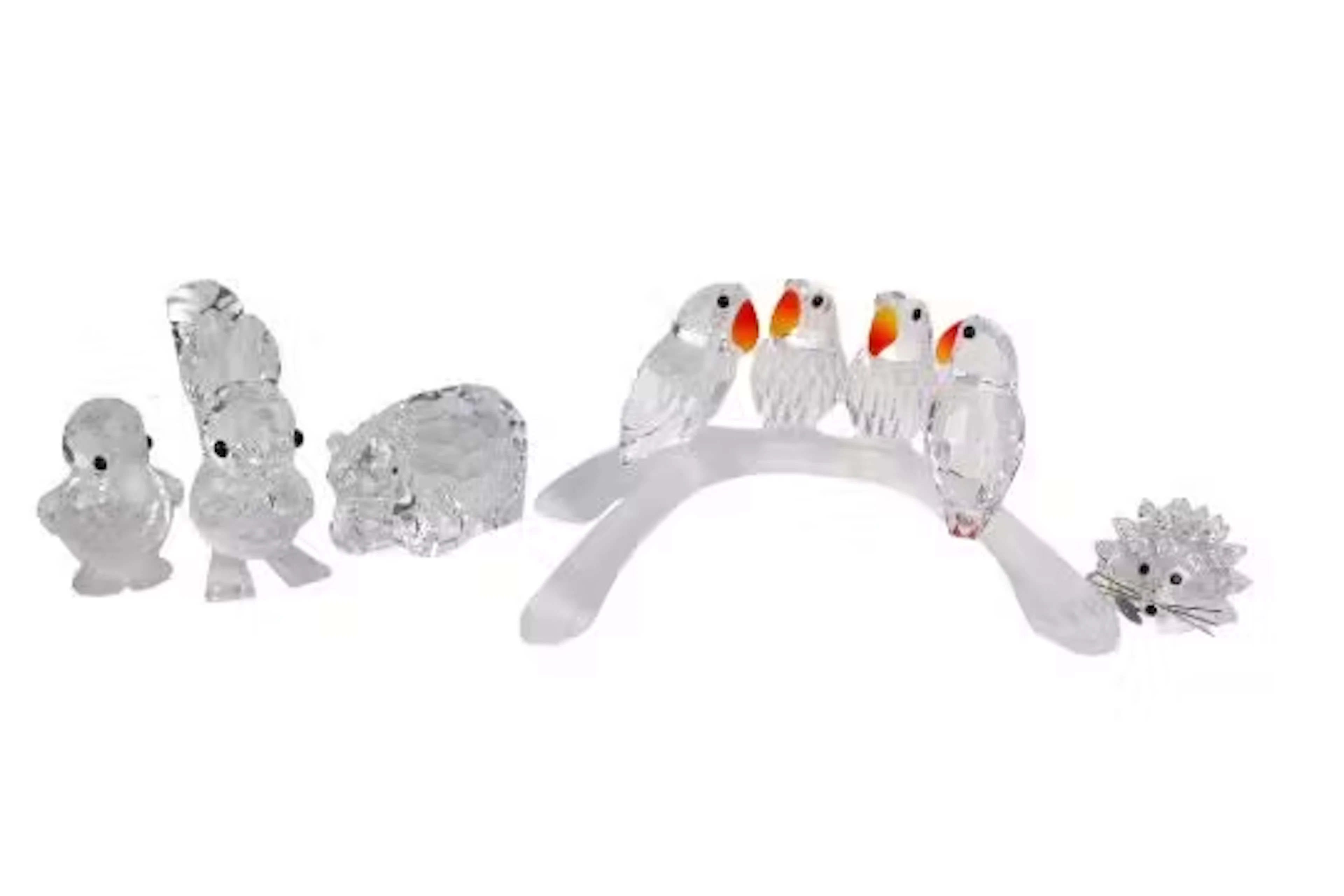 Five Swarovski crystal glass animals.