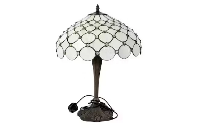 A modern 'Tiffany' style table lamp. Having a large leaded glass shade