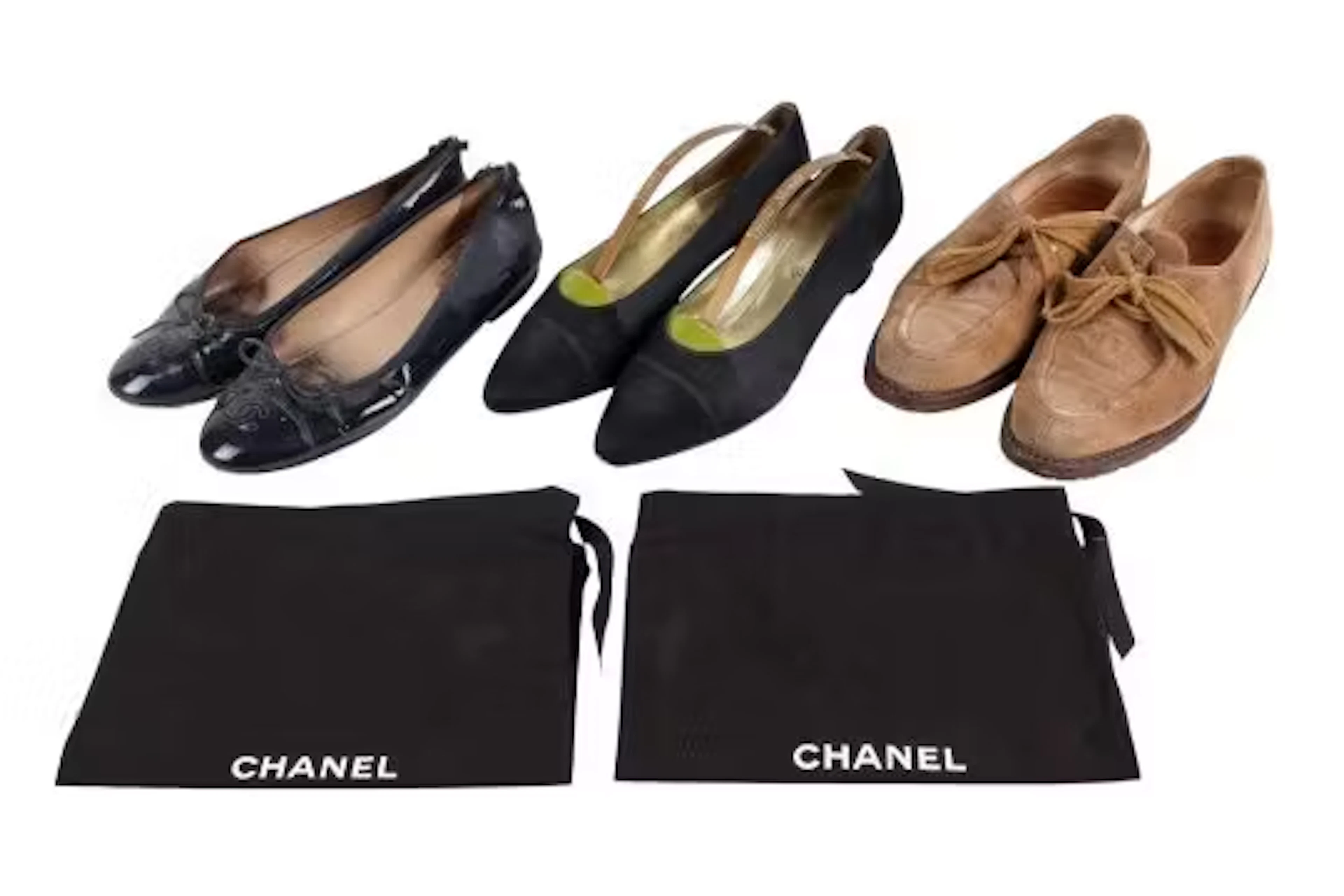 Three pairs of Chanel ladies shoes.