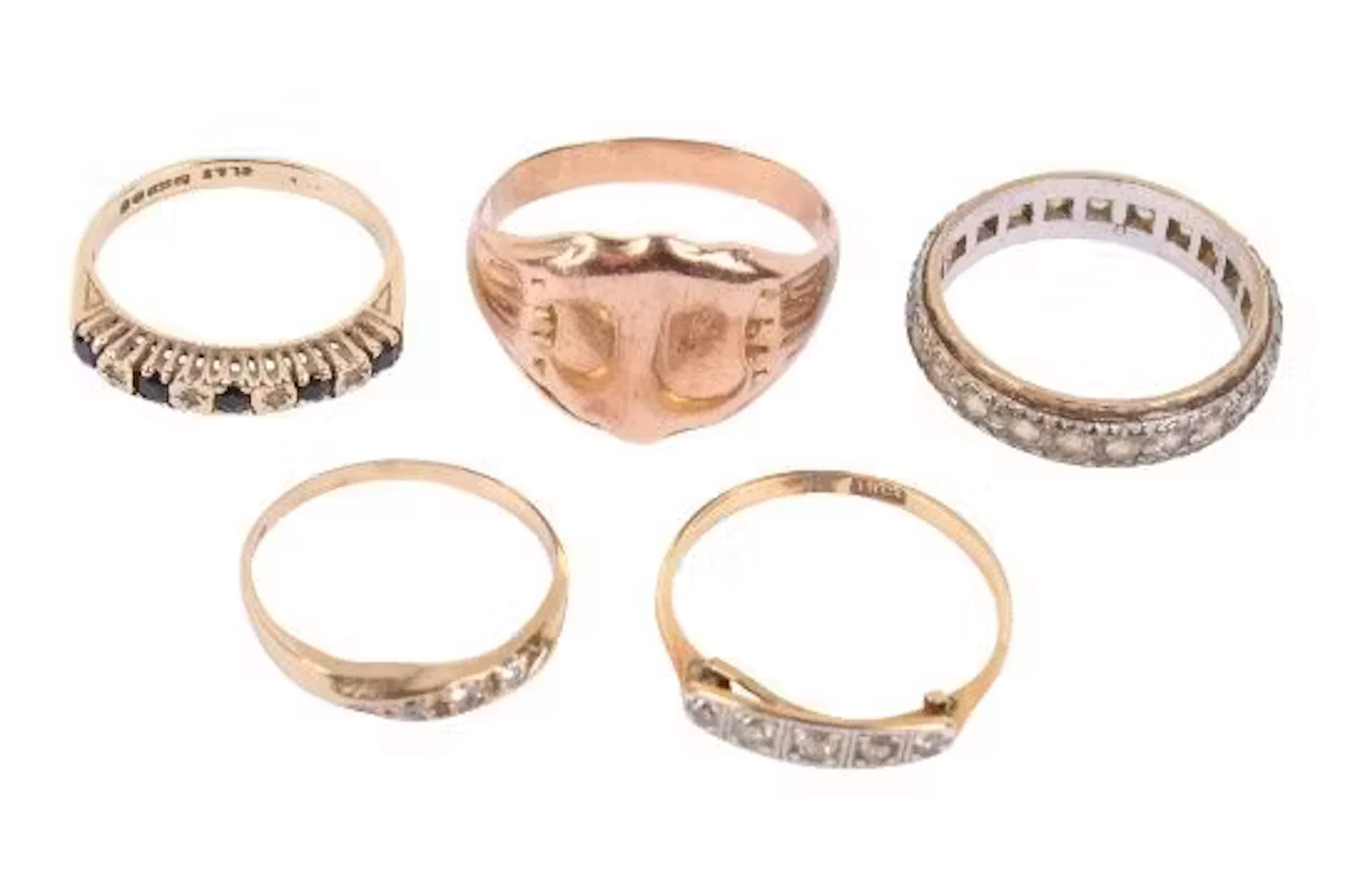 Five 18ct and 9ct gold rings.