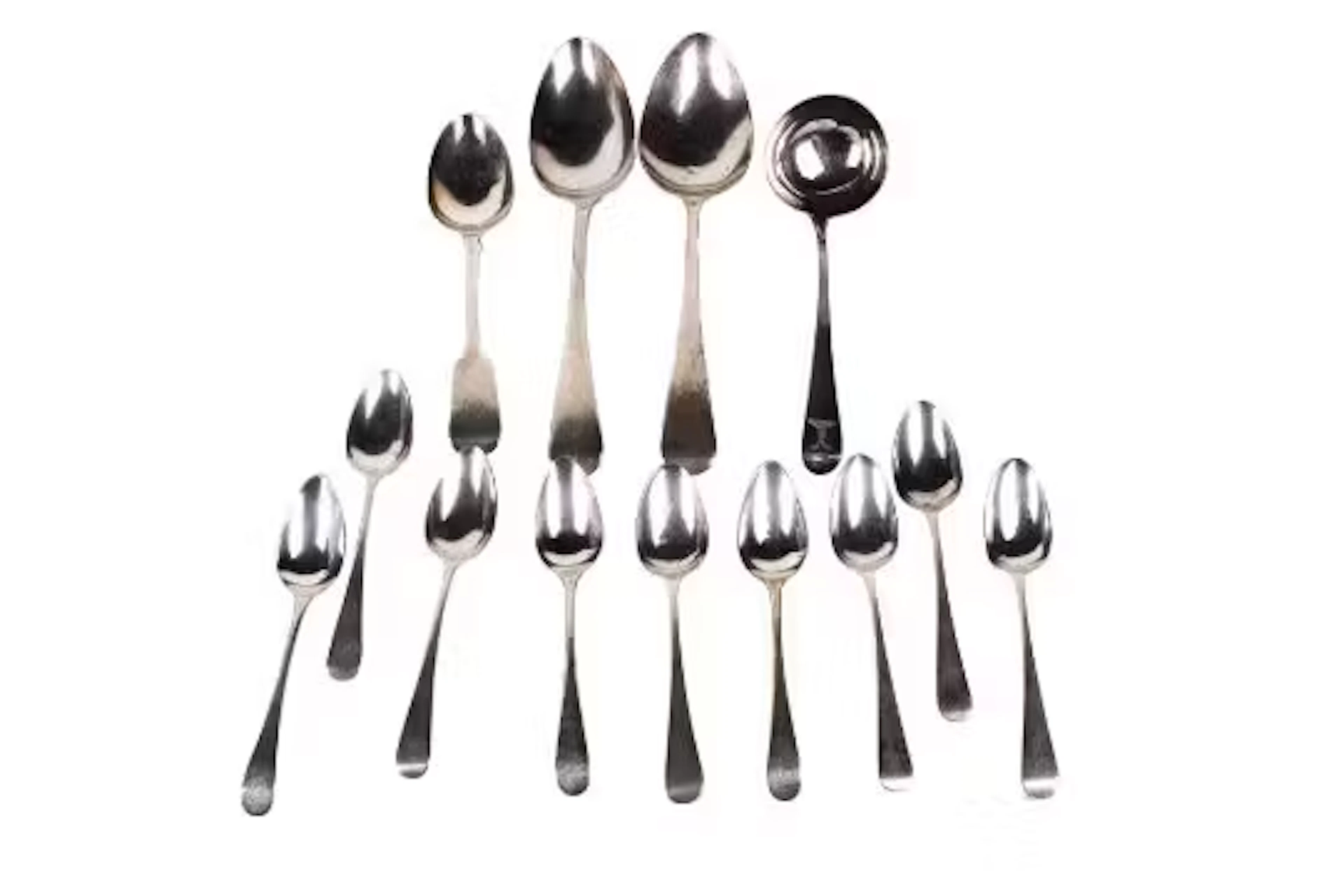 A collection of thirteen Georgian and Victorian silver spoons.