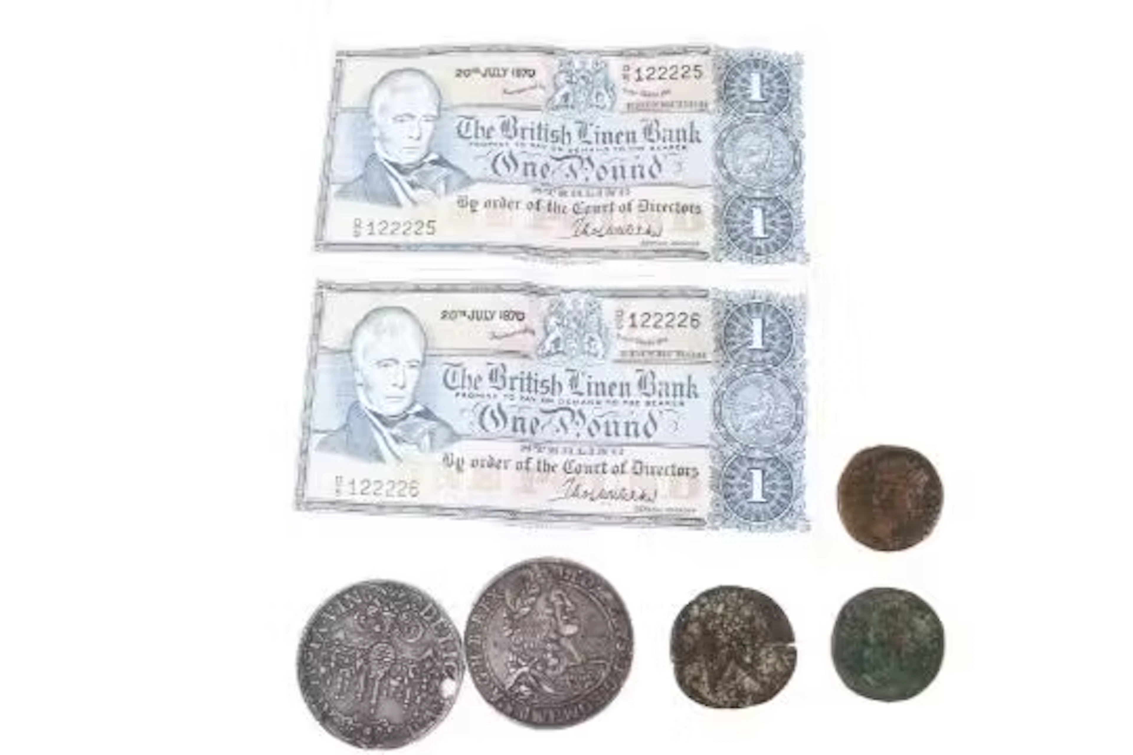 A collection of assorted coins and banknotes.