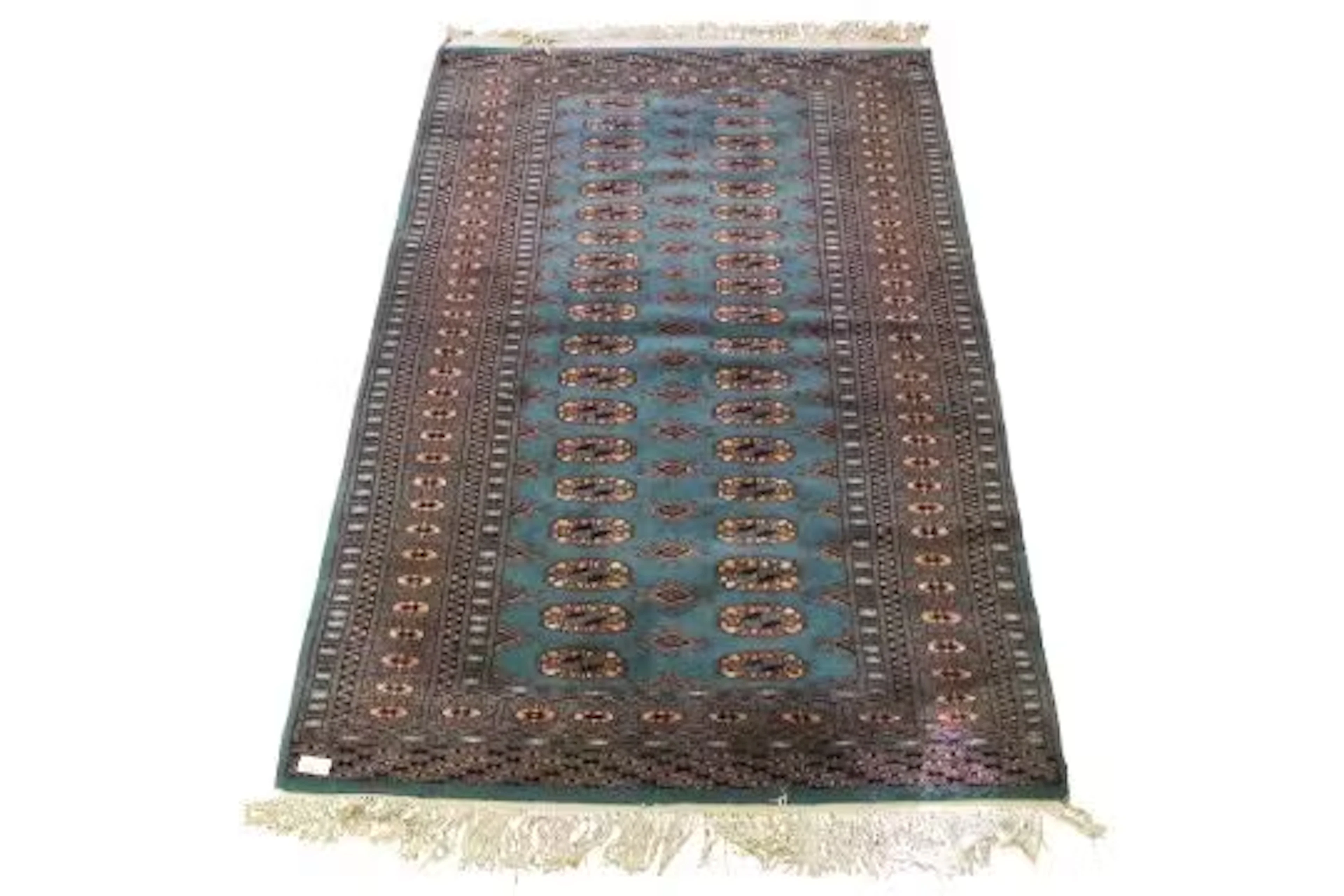 A vintage Bokhara rug.