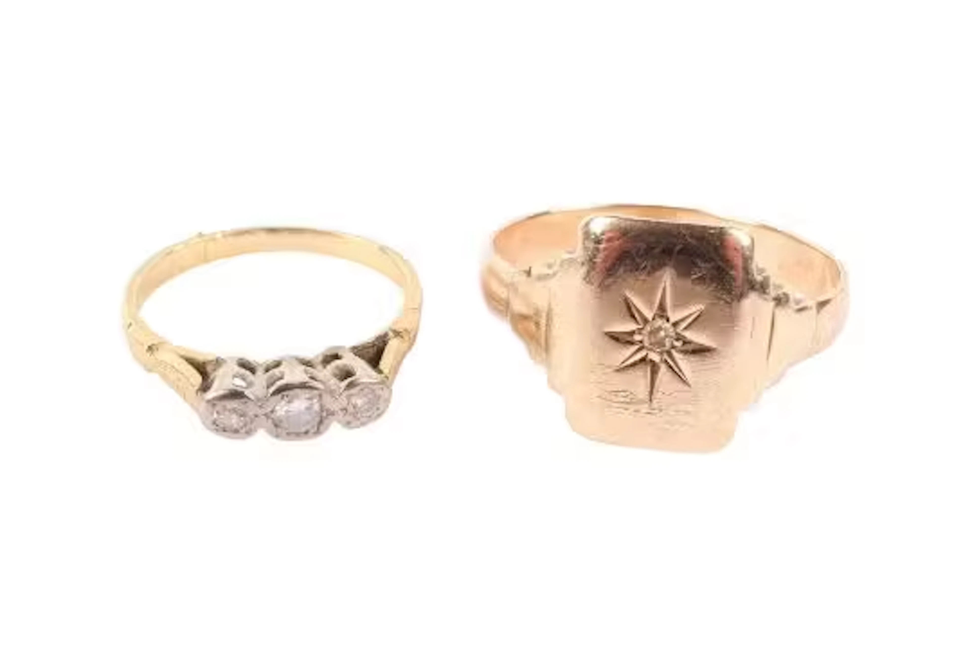 Two gold and yellow metal rings.