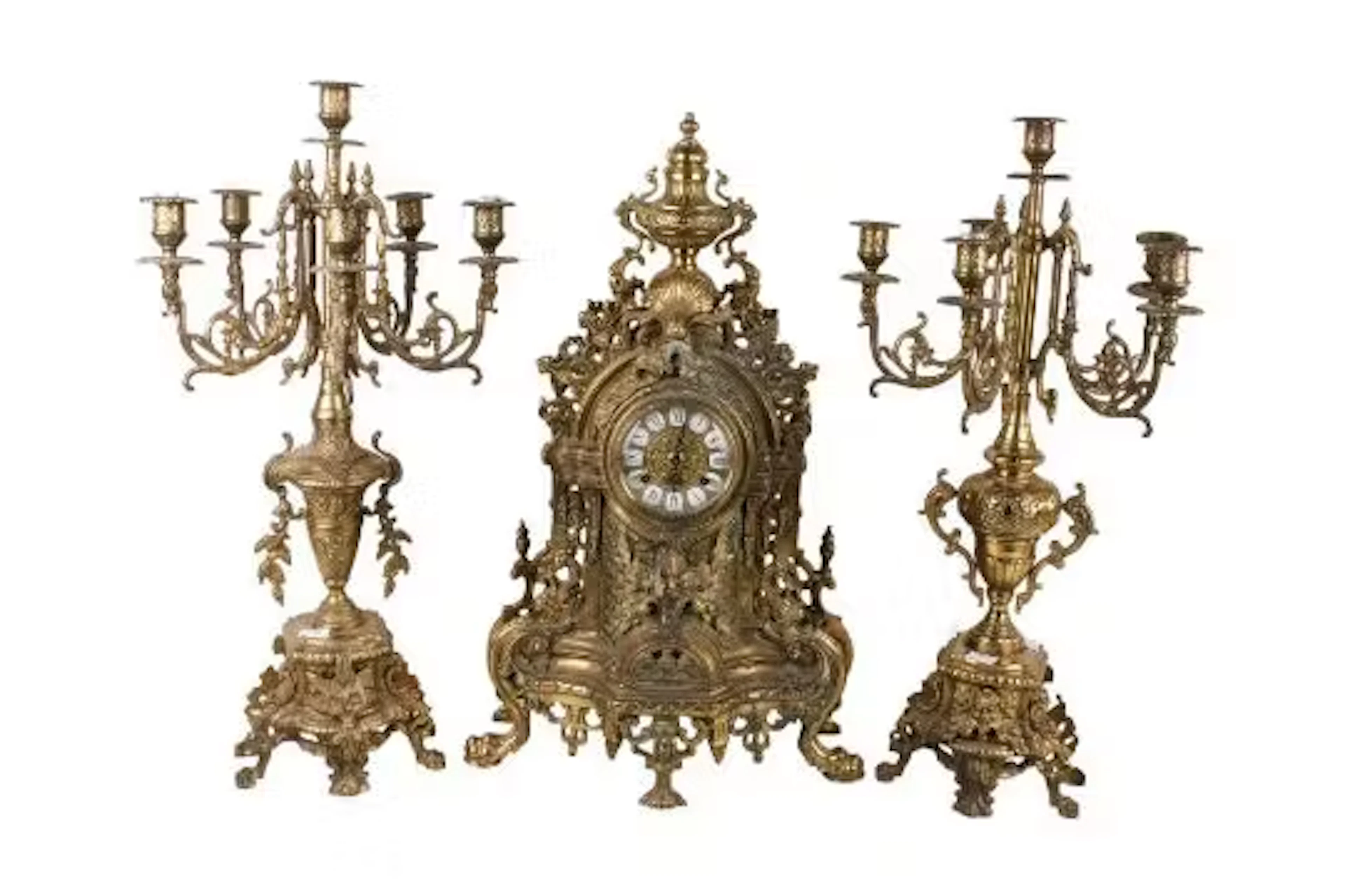 A reproduction three piece brass clock garniture, probably by Hermle.