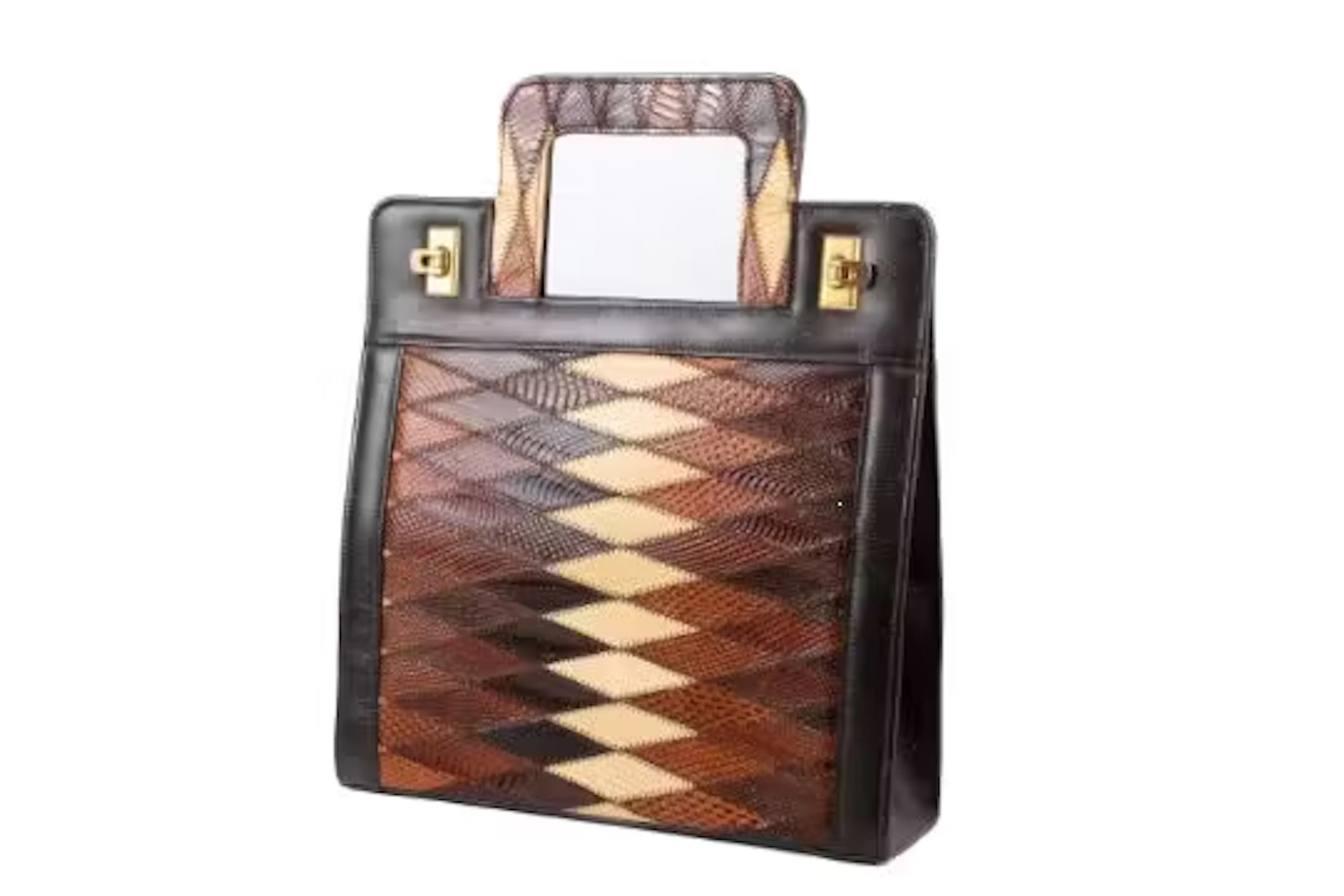 A vintage 1970s Kaufmann of London handbag and matching purse.