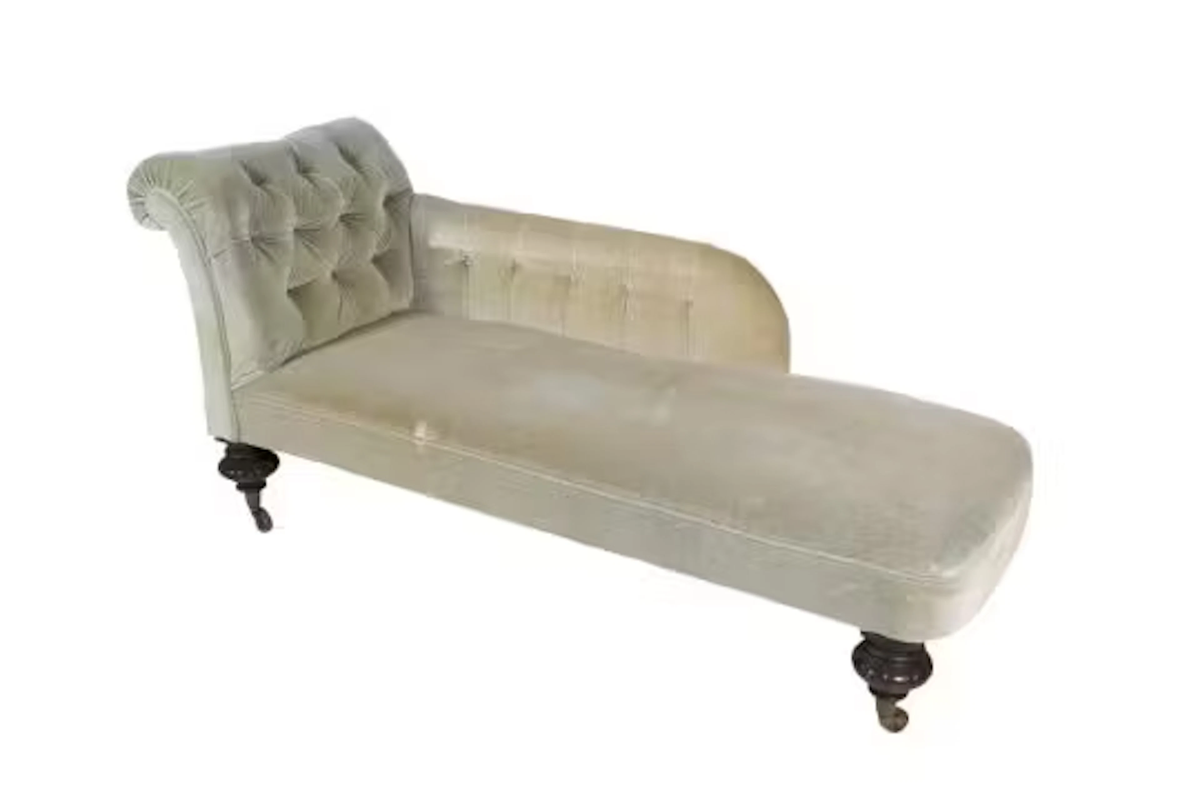 A Victorian light green upholstered chaise longue.