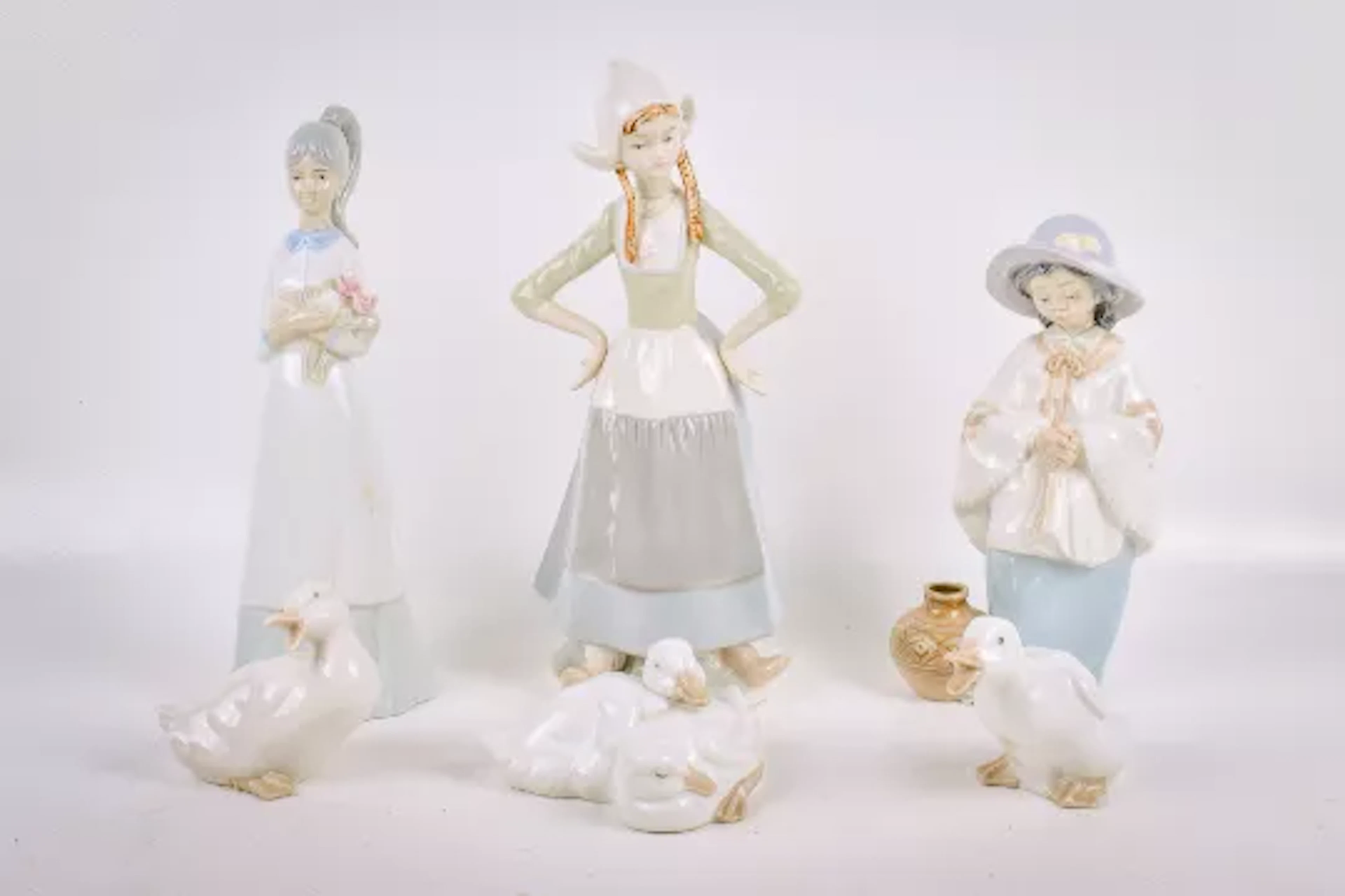 A group of six assorted Spanish porcelain figures. Including Nao ducks
