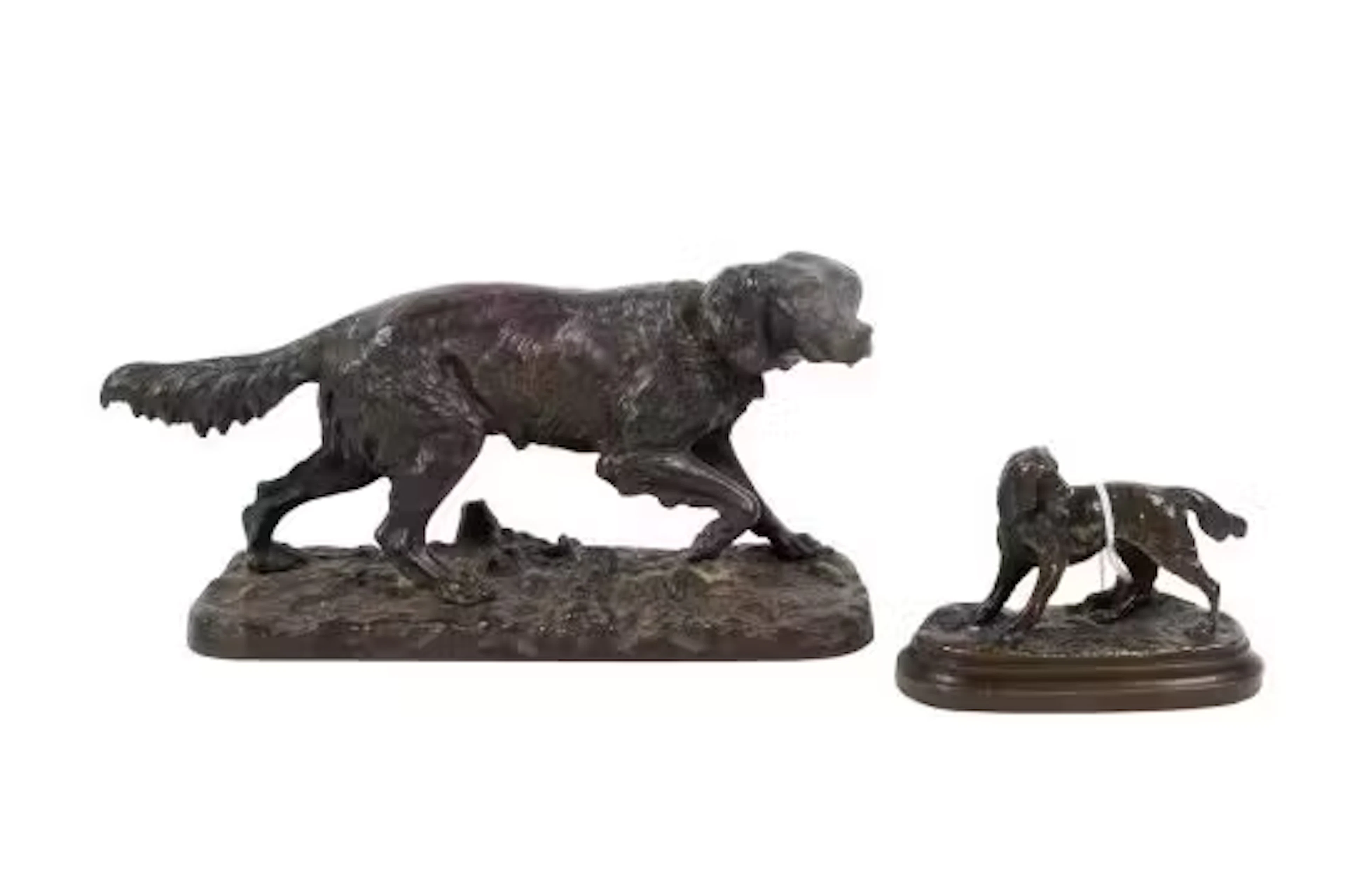 Two well modelled 'animalia' cast metal sculptures modelled as dogs