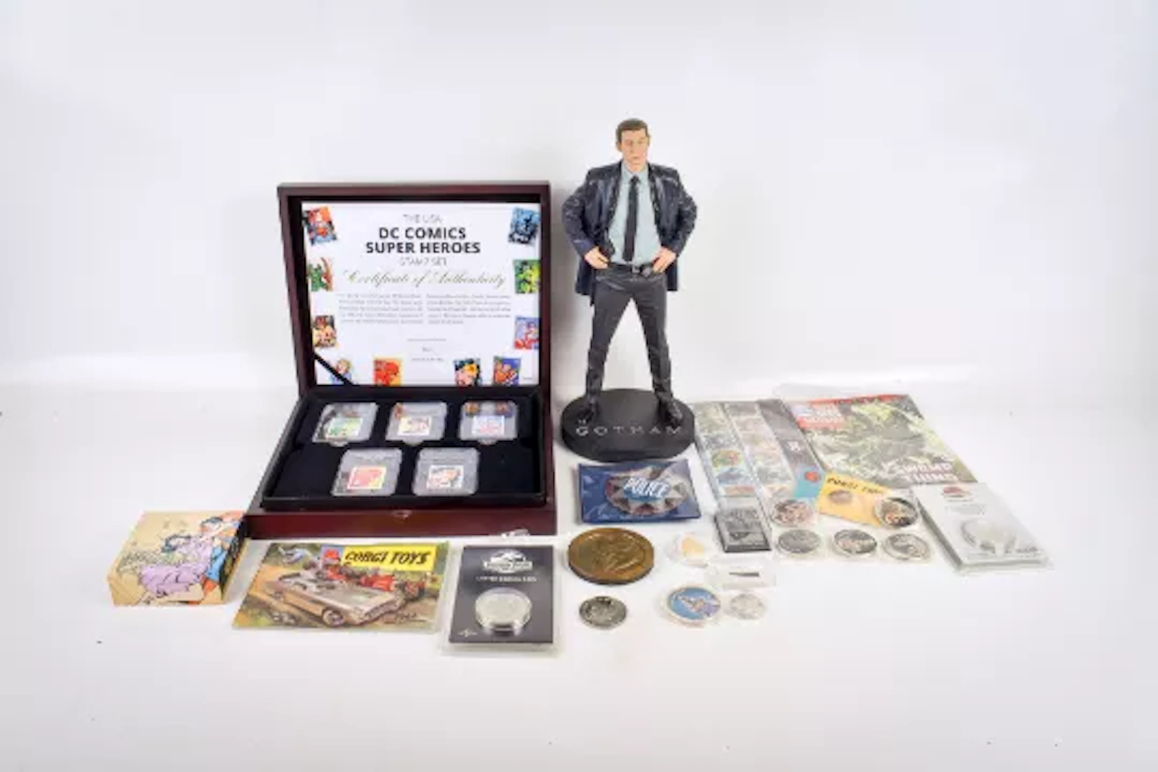An assortment of Super Hero, film and comic collectables.
