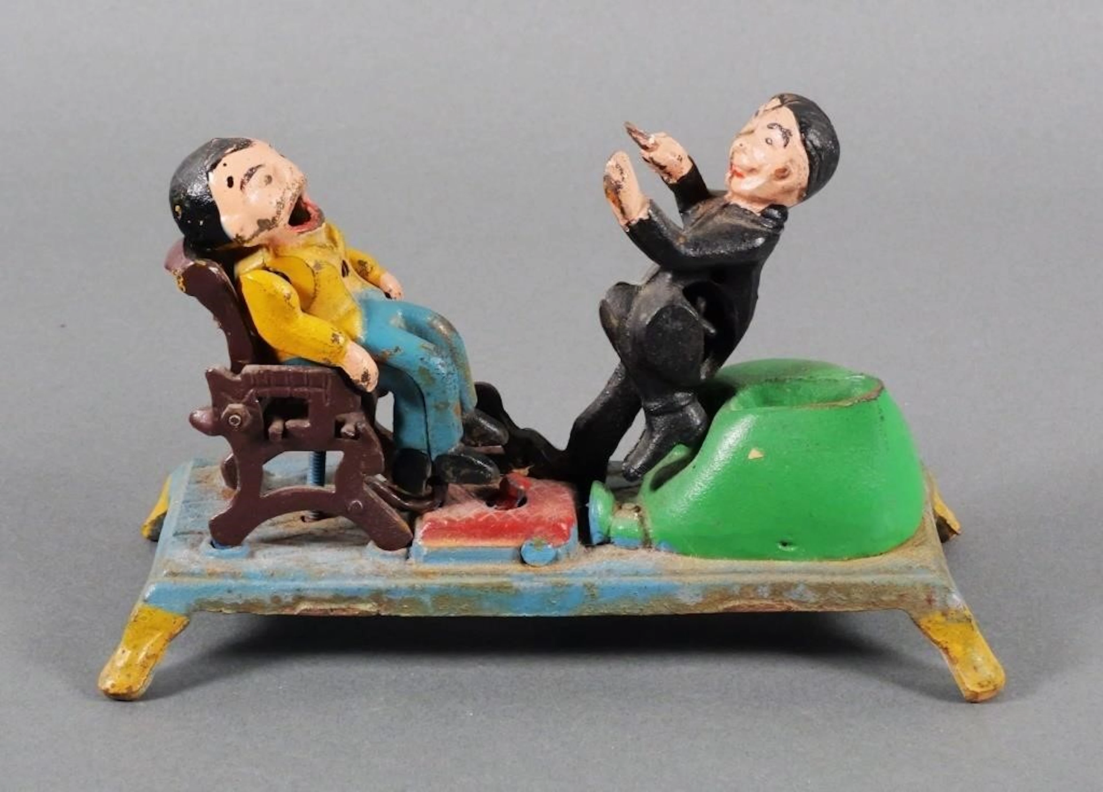 Cast Iron Mechanical Bank Dentist Pulling Tooth