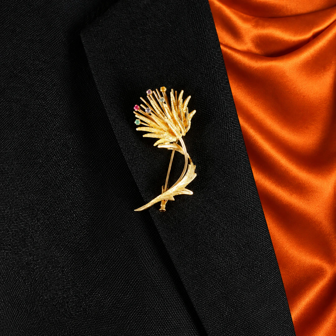Broche "Fleur" en or jaune 18K (750/oo)