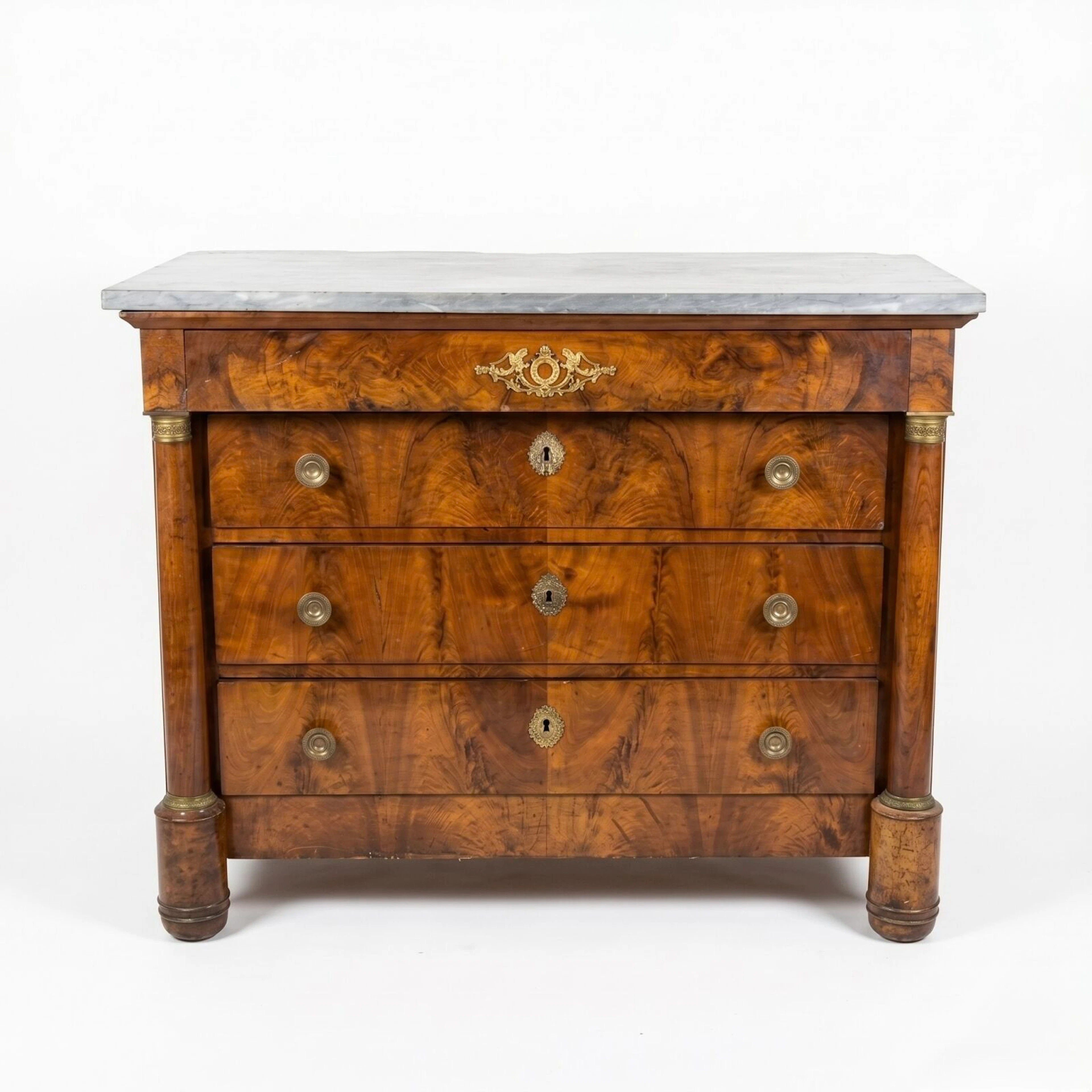 Commode Empire en placage d'acajou flammé flanqué de deux...