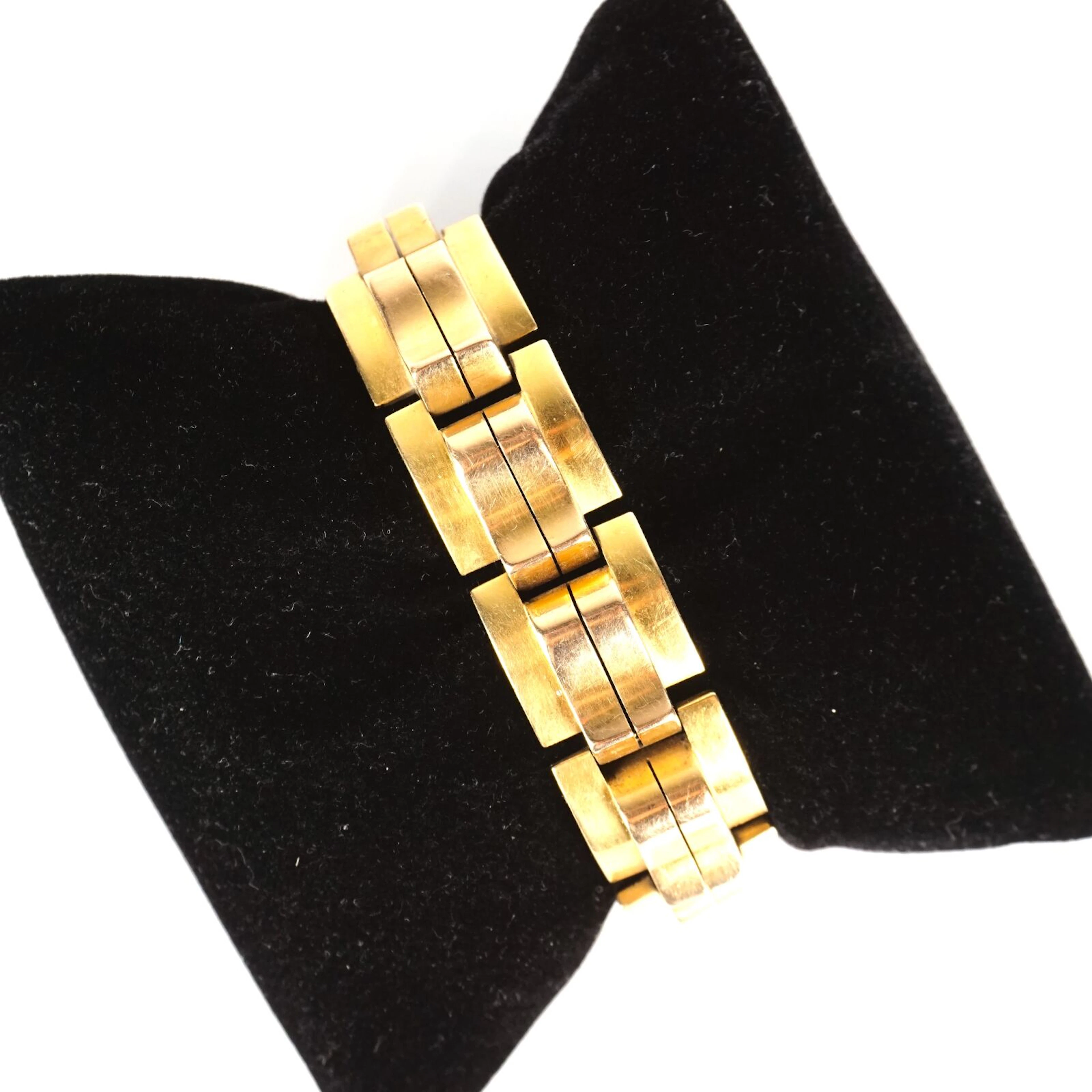 Bracelet articulé en or jaune 18K (750/oo)