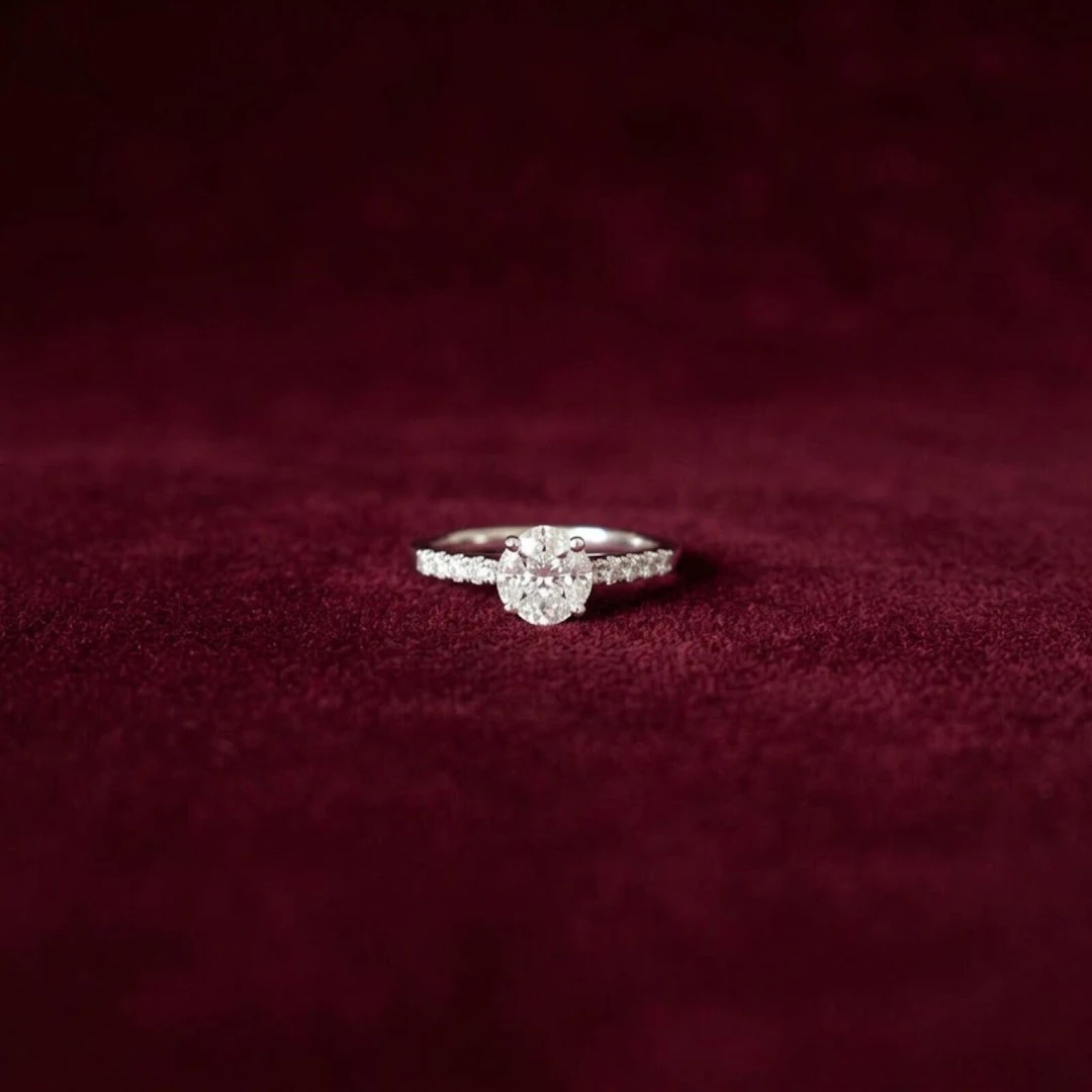 Solitaire en or blanc 18K (750/oo)