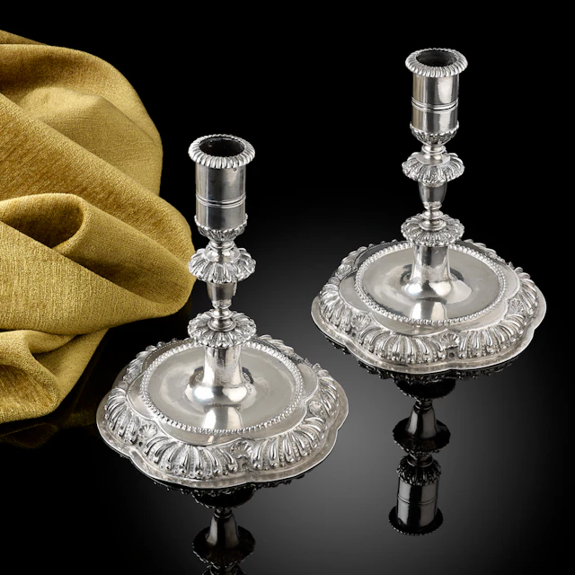 A fine pair of Baroque silver Candlesticks