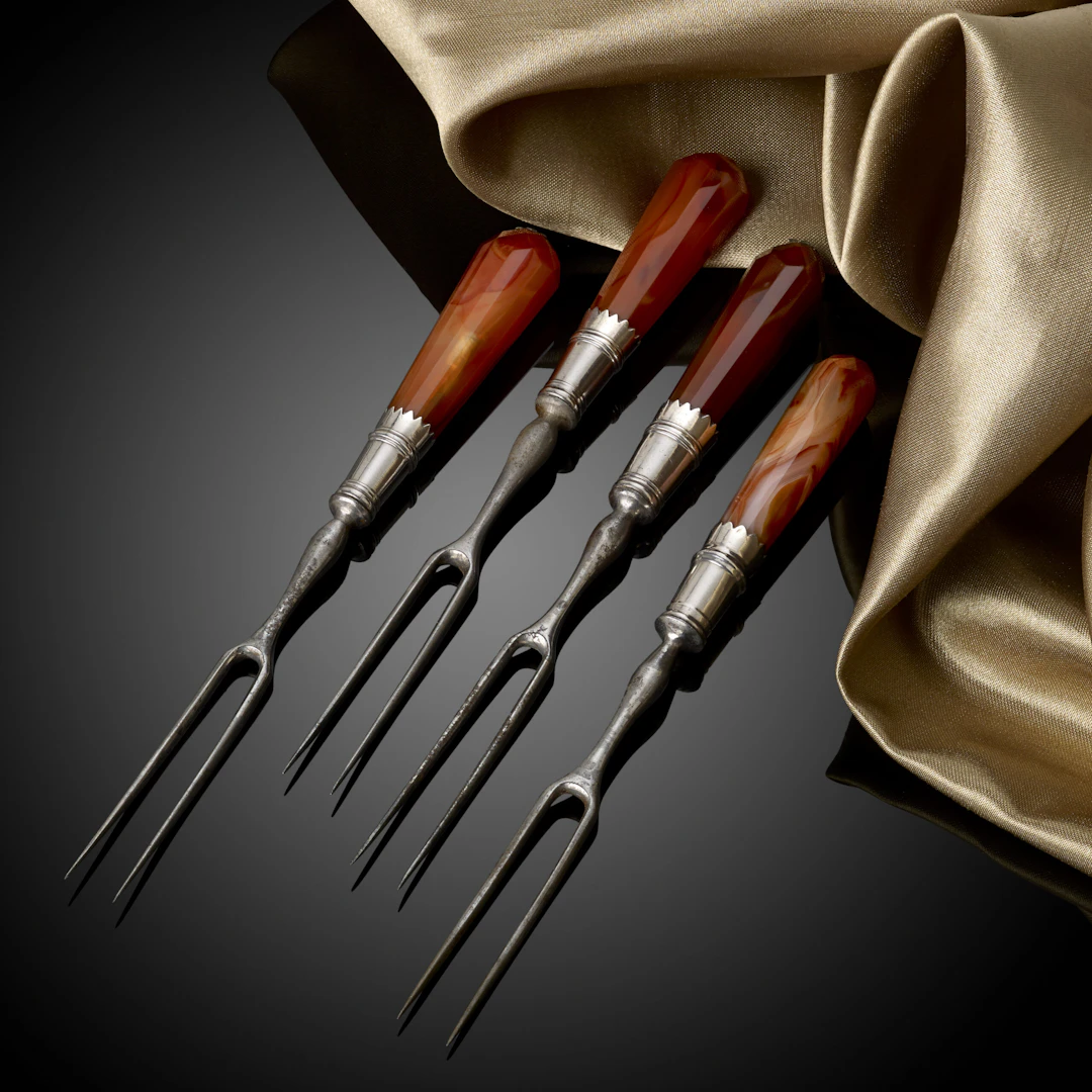 A rare set of four 17th Century William & Mary sweetmeat forks