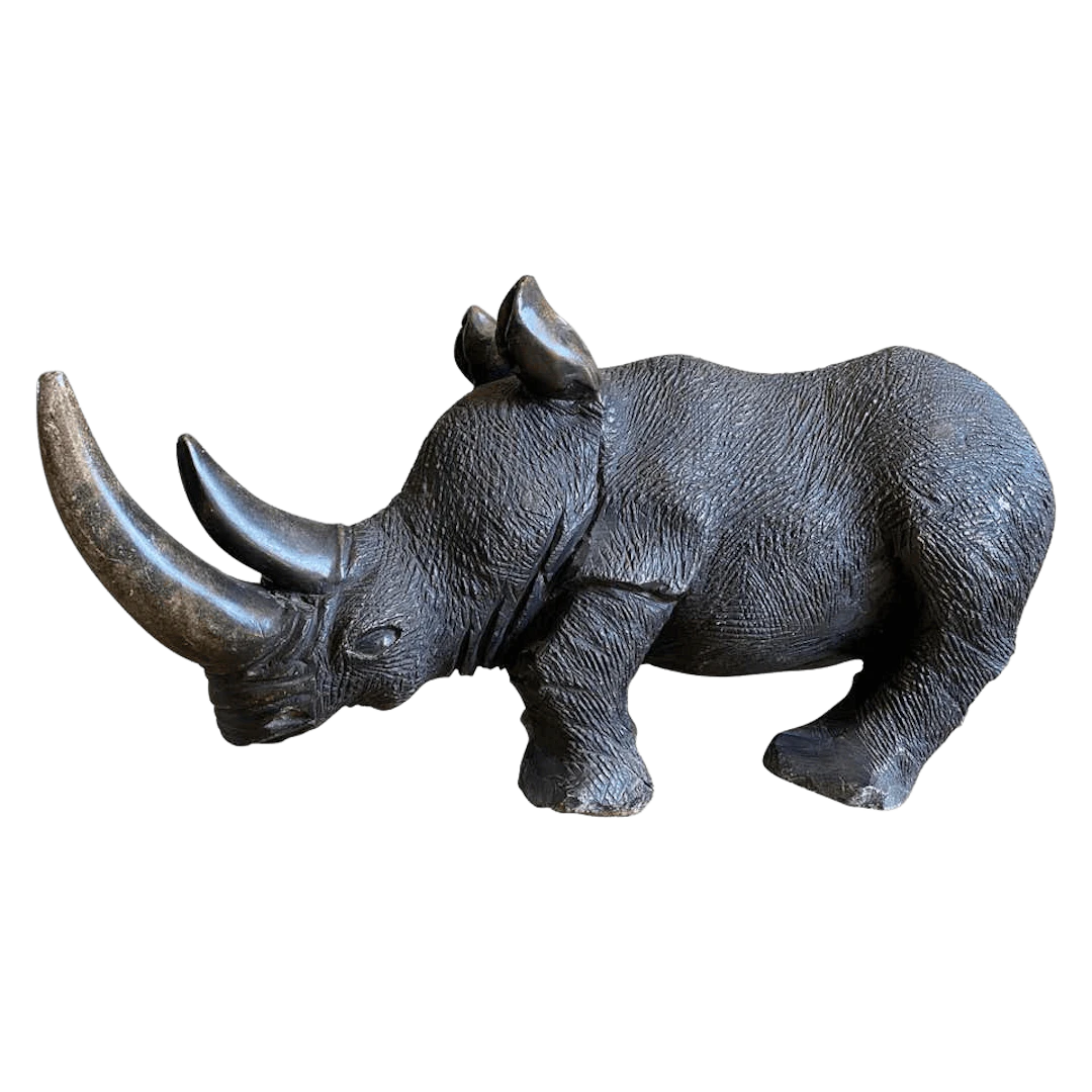 Large carved stone rhino sculpture