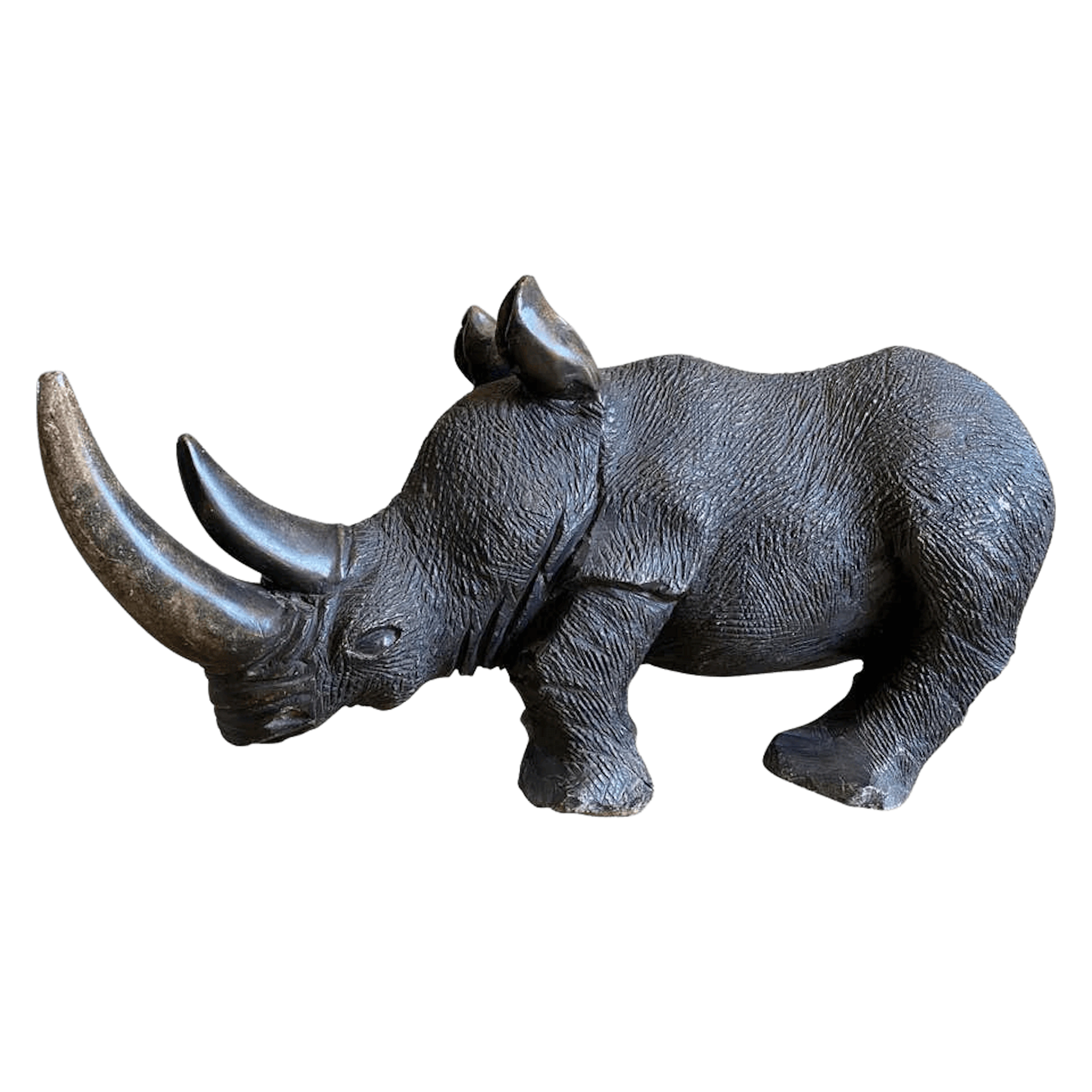 Large carved stone rhino sculpture