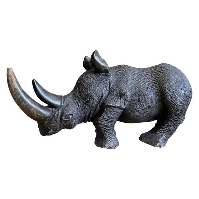 Large carved stone rhino sculpture